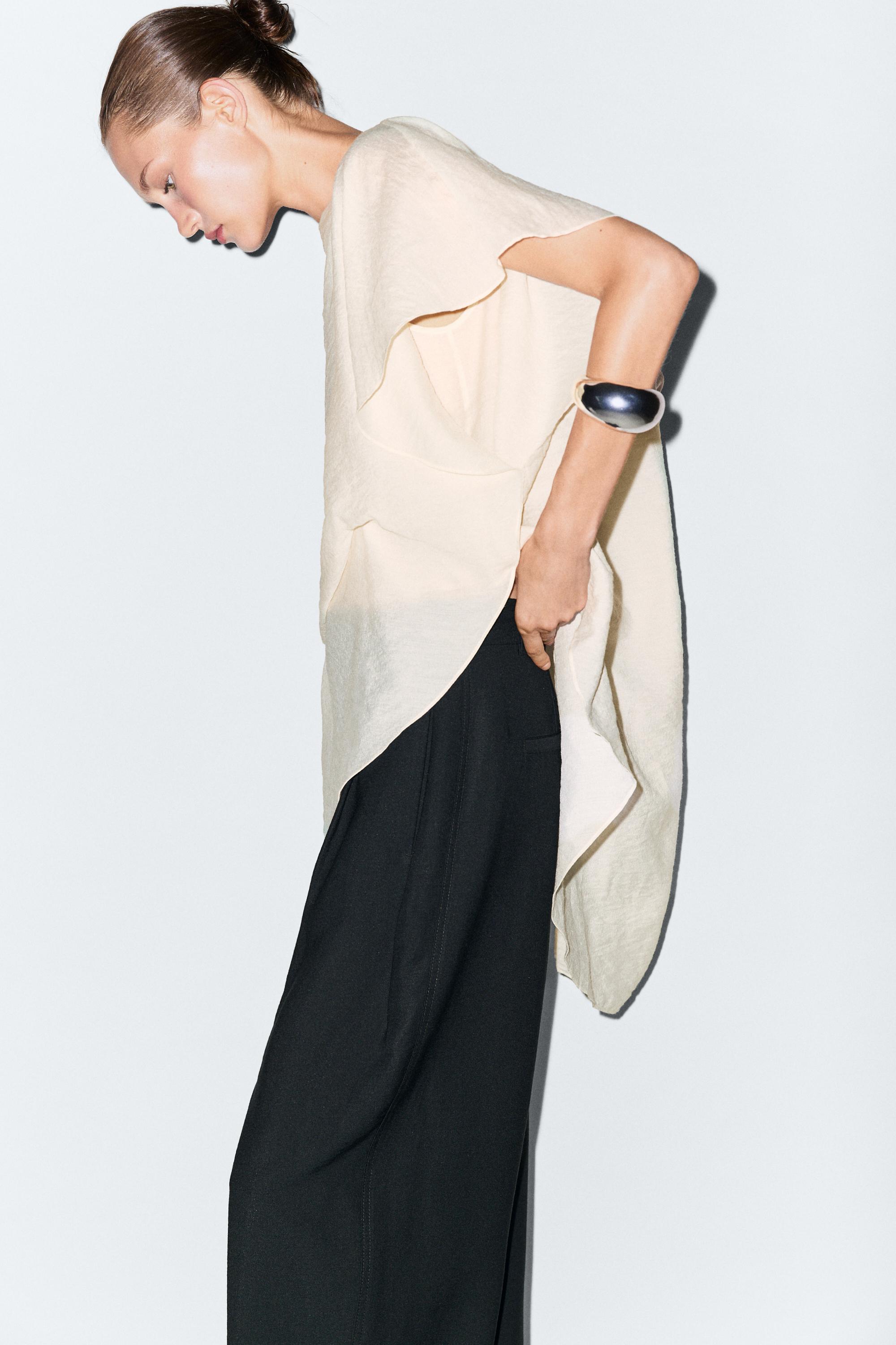 Asymmetric cape-style flowing blouse — Oyster-white
