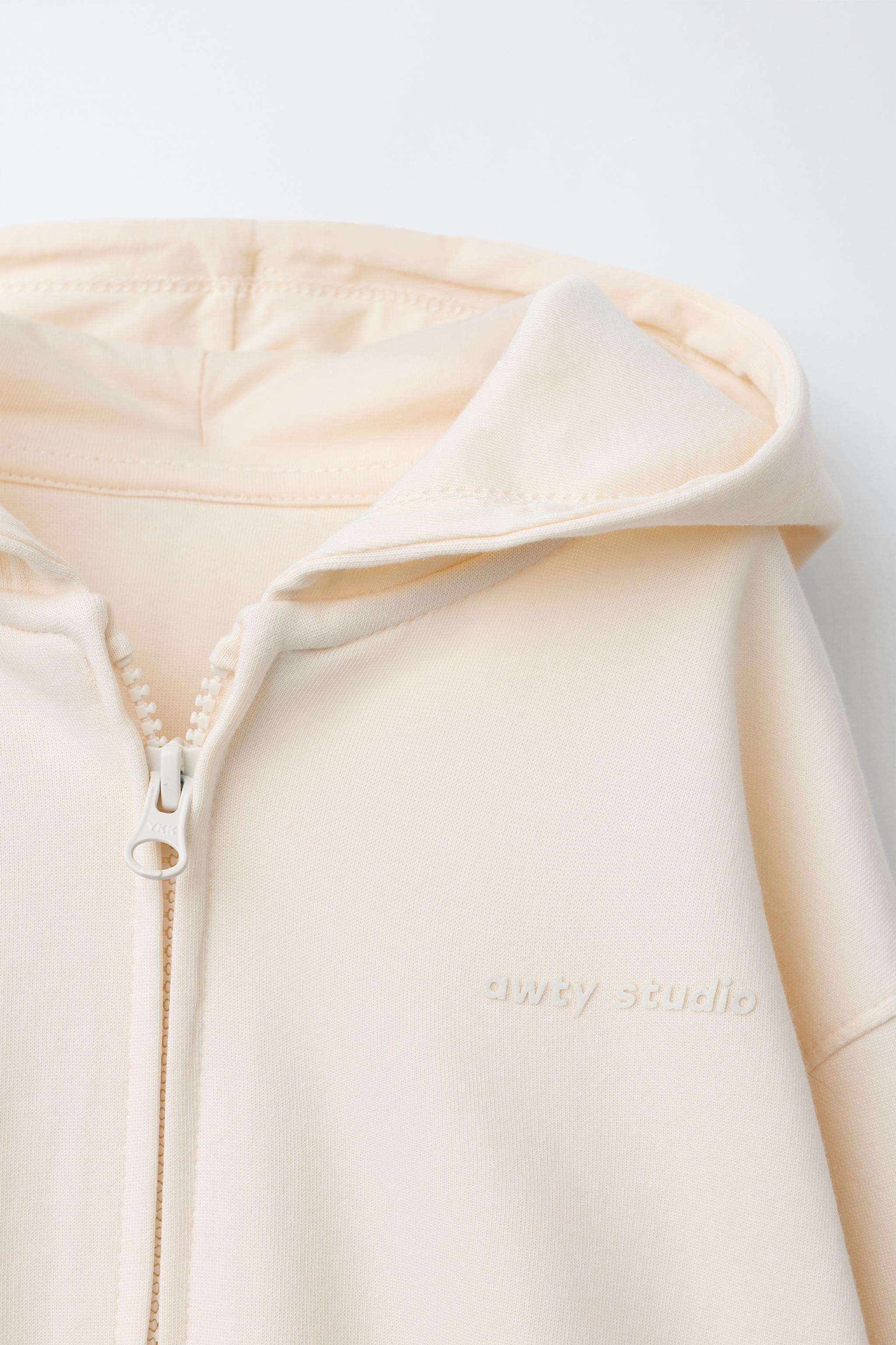 INTERLOCK ZIP-UP SWEATSHIRT WITH EMBOSSED TEXT - Pastel blue
