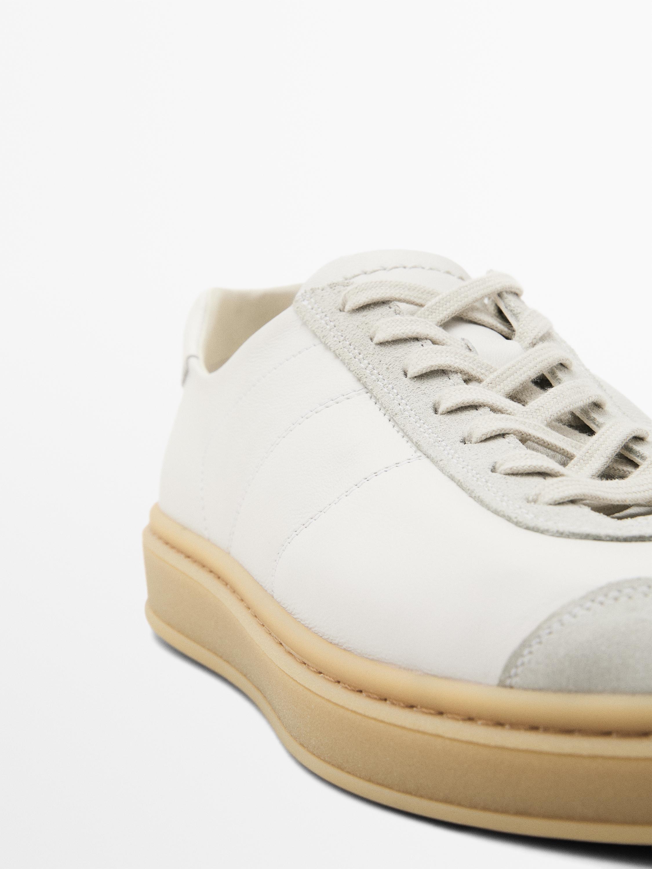 Tennis cuir contrastant