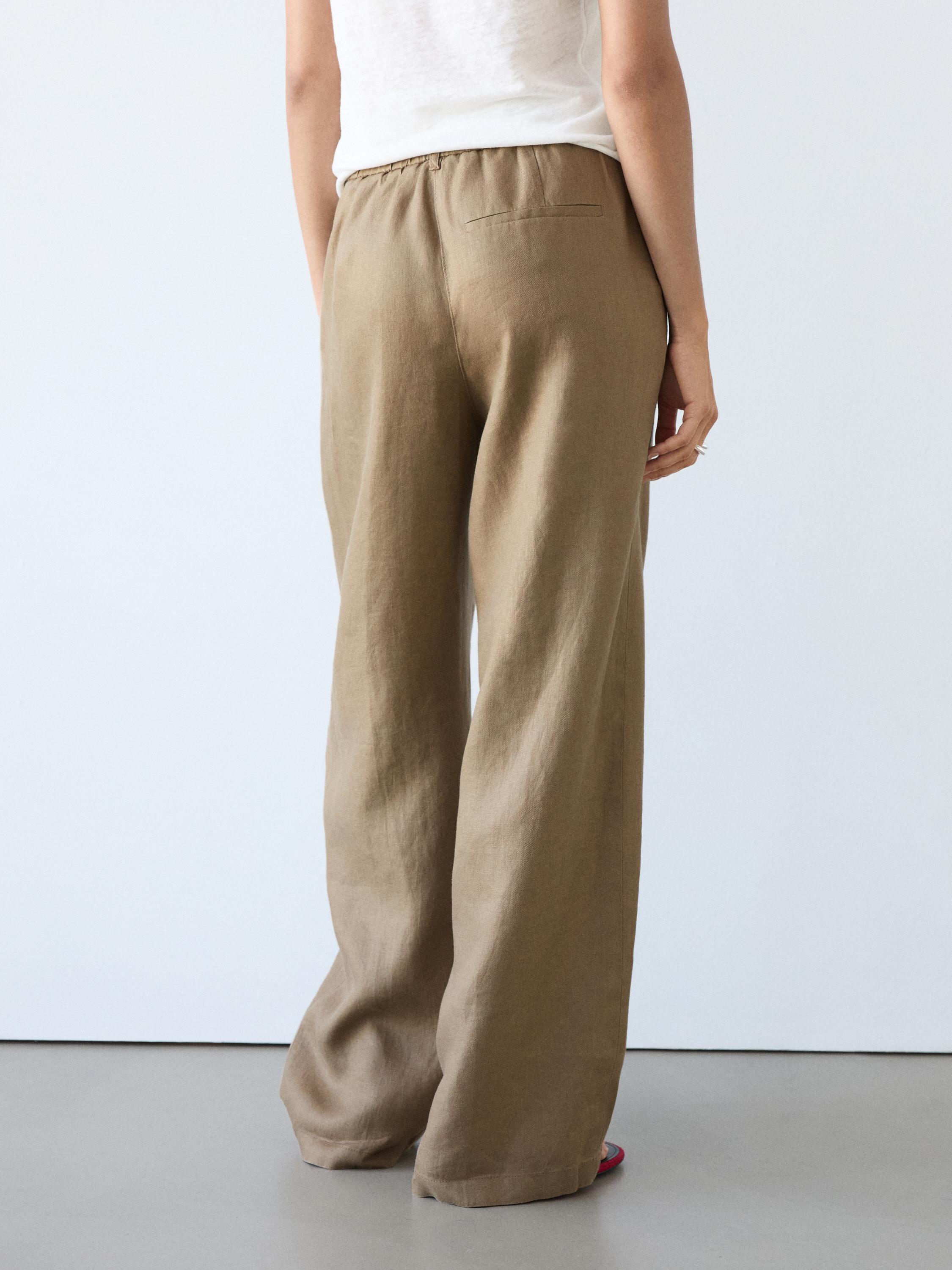 100% linen wide-leg elasticated trousers