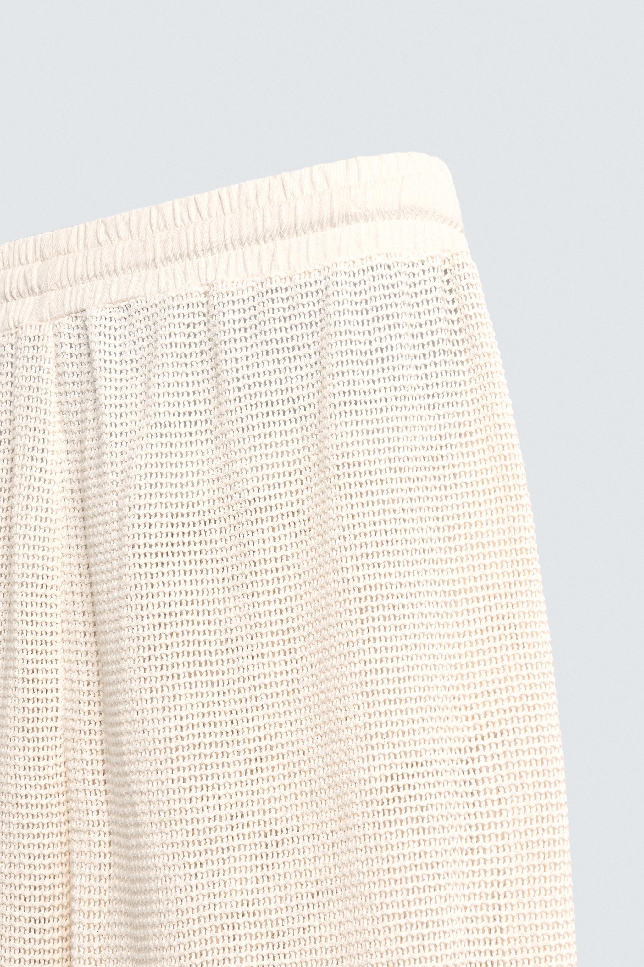 PANTALON COUPE DÉCONTRACTÉE STRUCTURE OUVERTE