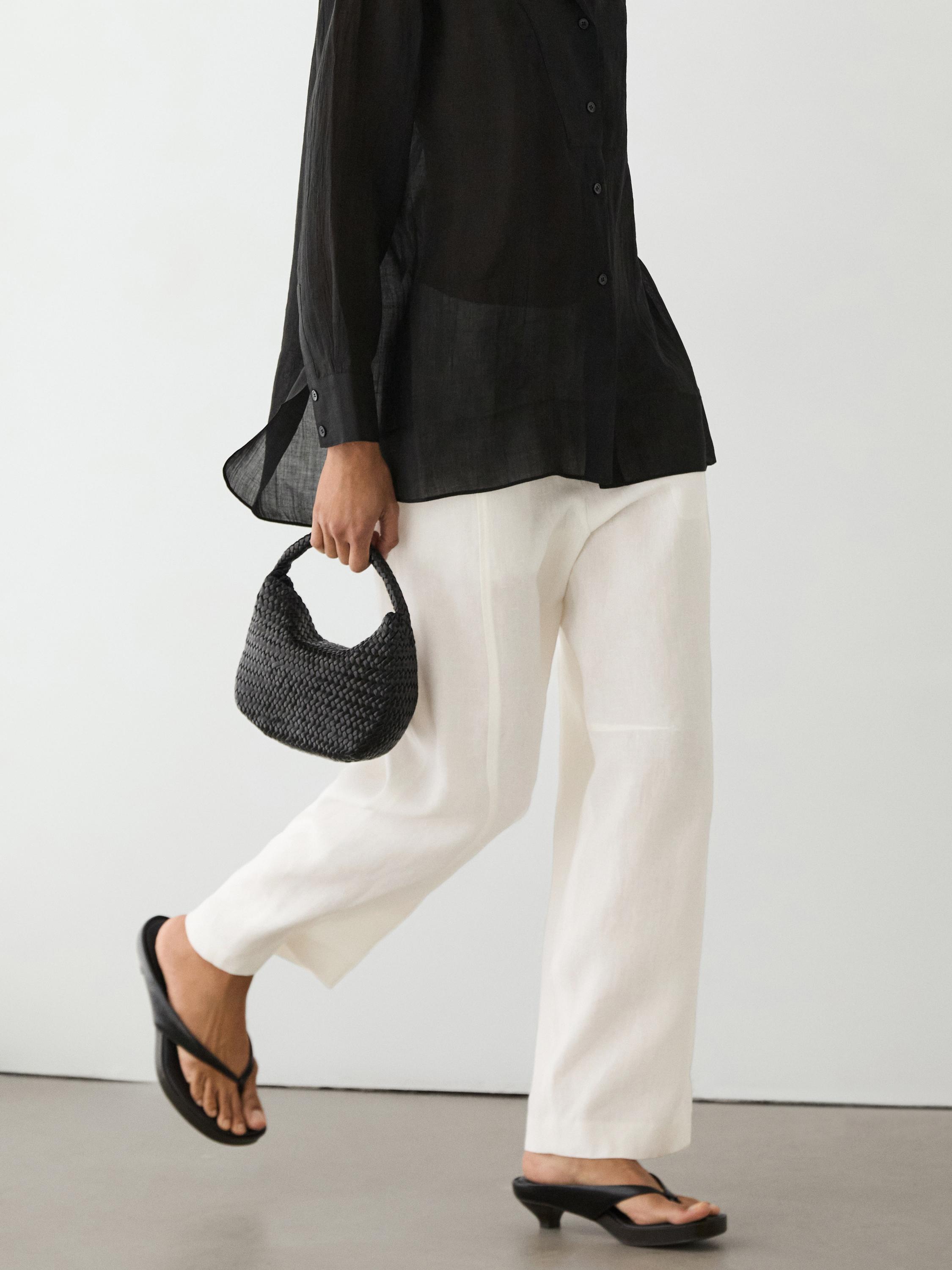 Flowing semi-sheer shirt with chest detail