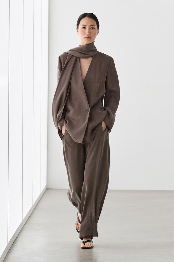 Total look flowing overshirt with tie detail from Zara - $320
