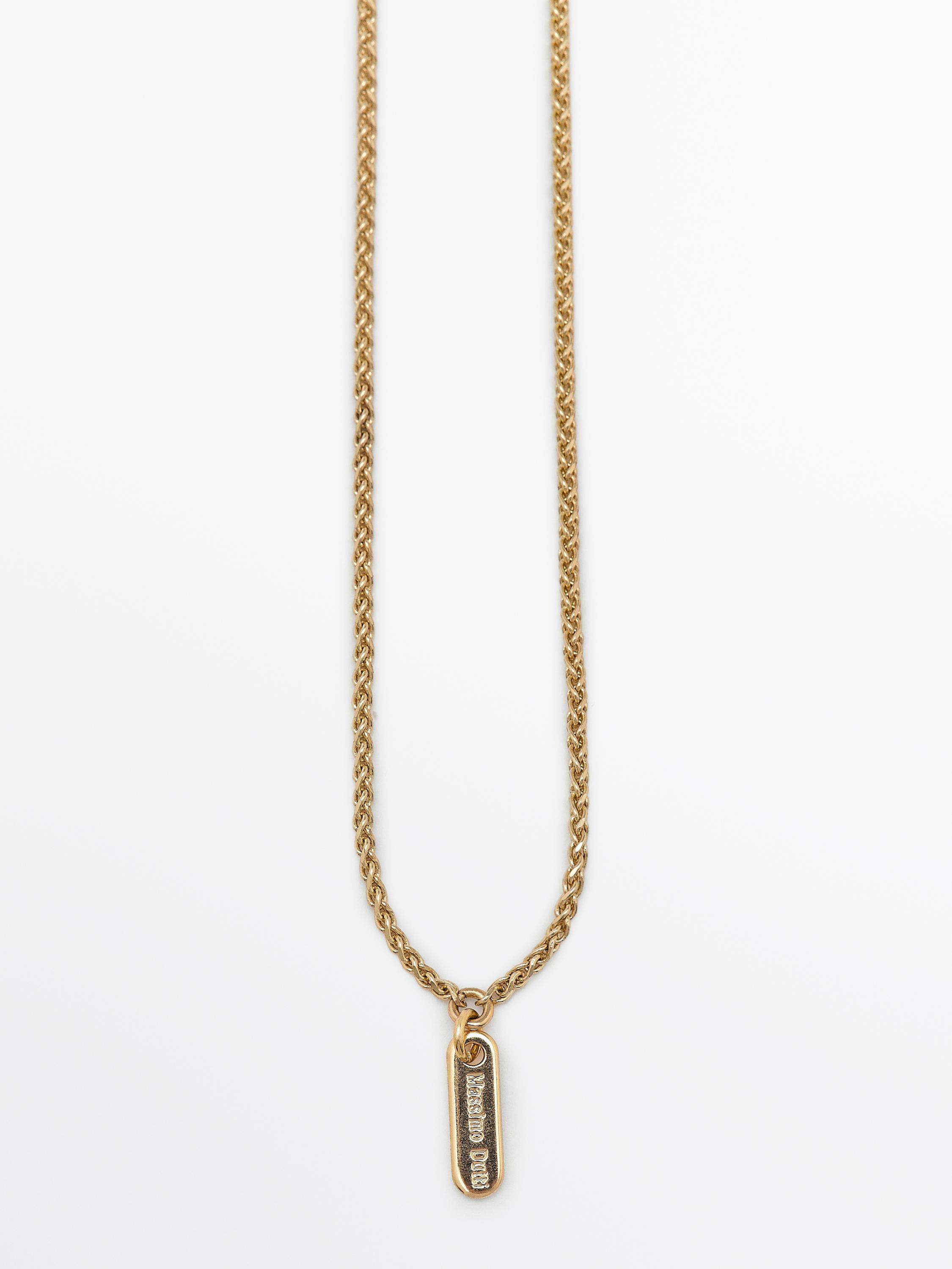 Necklace with lace piece pendant