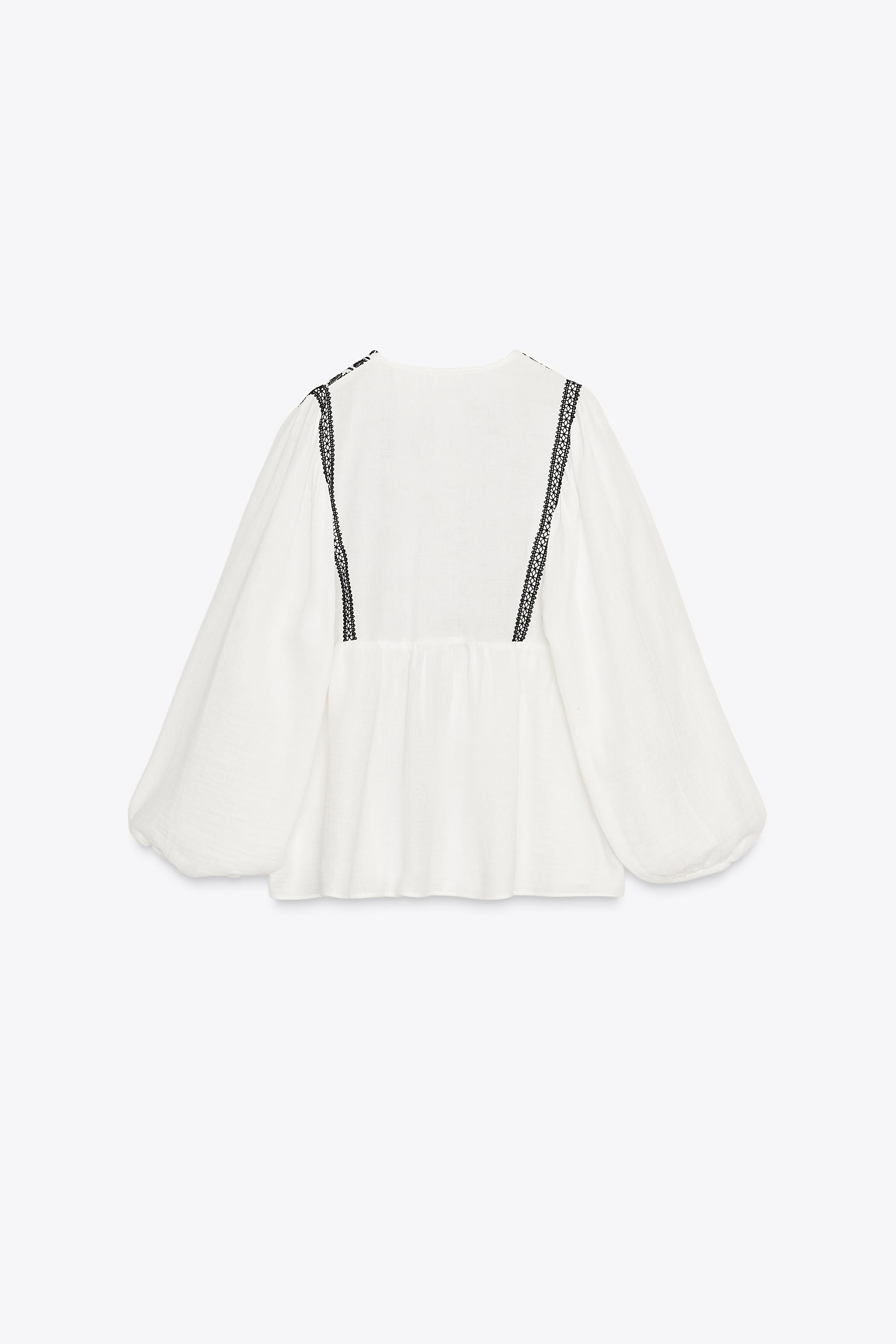 VESTE BRODERIES CONTRASTANTES