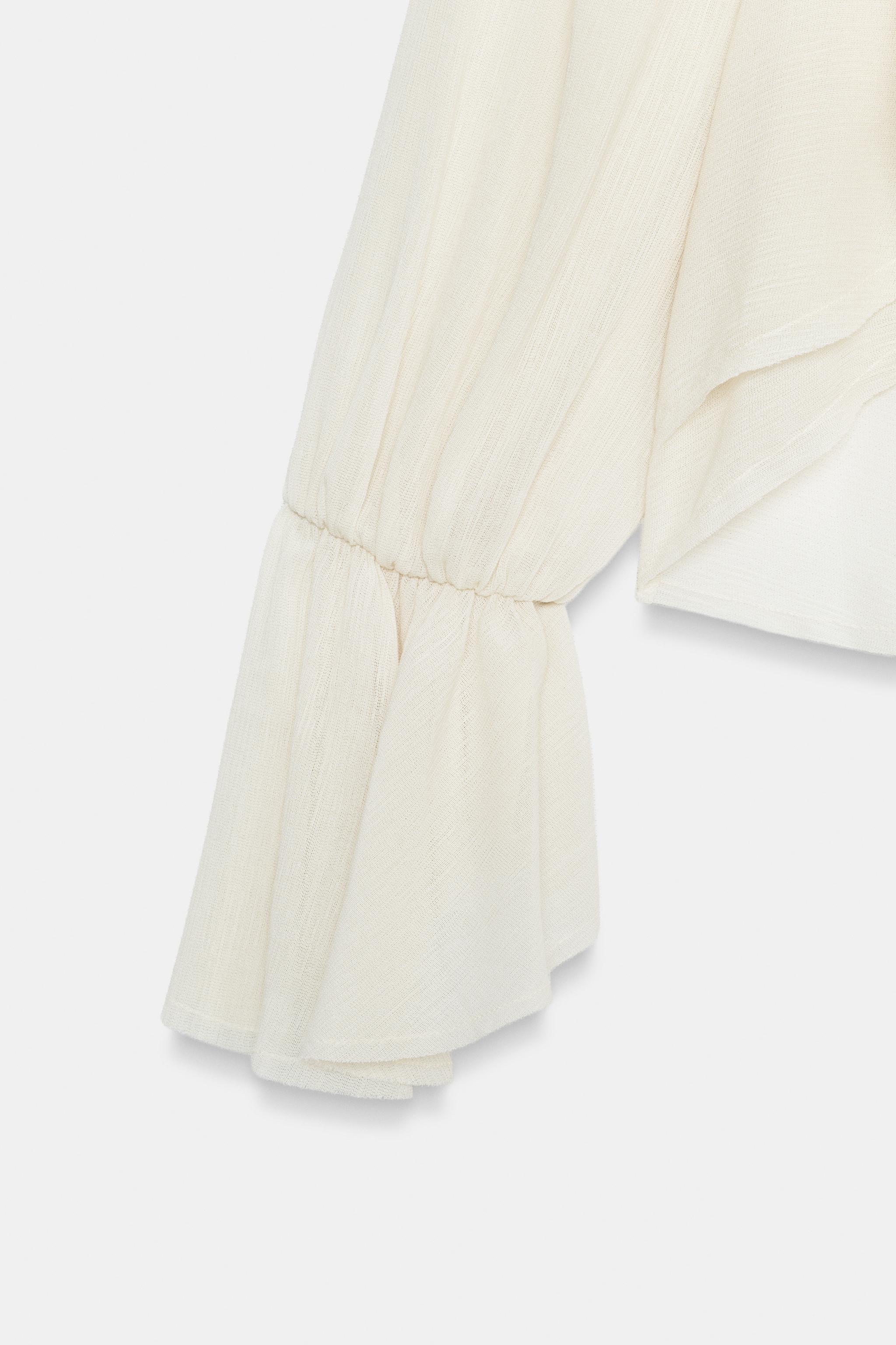 SEMI-SHEER RUFFLED TOP