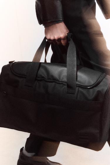 Zaras GUMMERAD RESVÄSKA - Svart