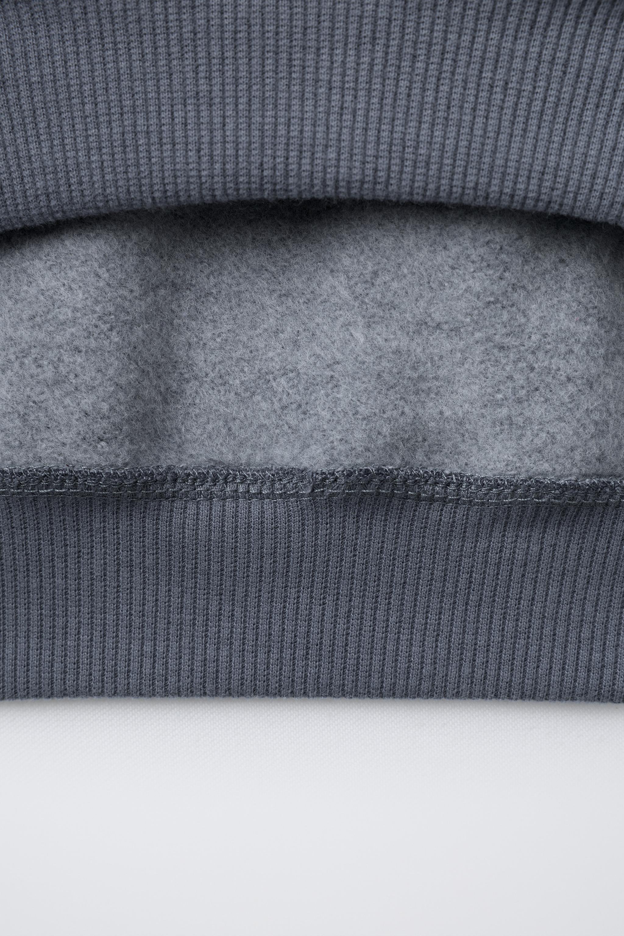 ANIMAL PRINT SWEATSHIRT