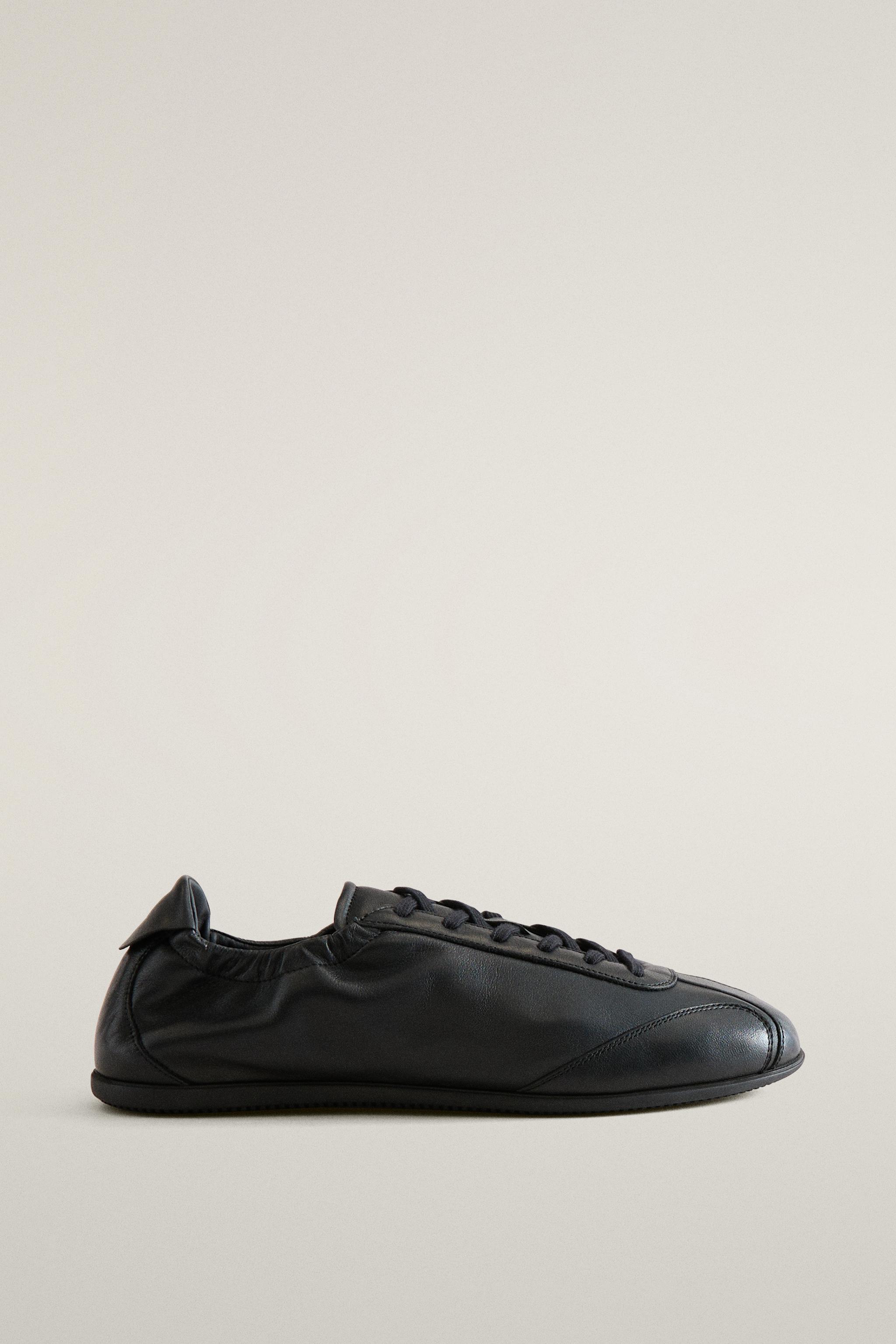 CHAUSSONS TENNIS EN CUIR