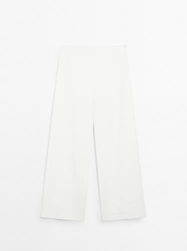 Pantalón palazzo tiro alto - STUDIO - Blanco de Zara