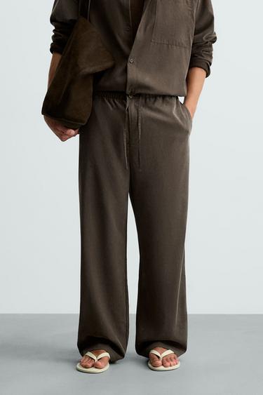 CALÇA FLUIDA RELAXED FIT - Chocolate da Zara