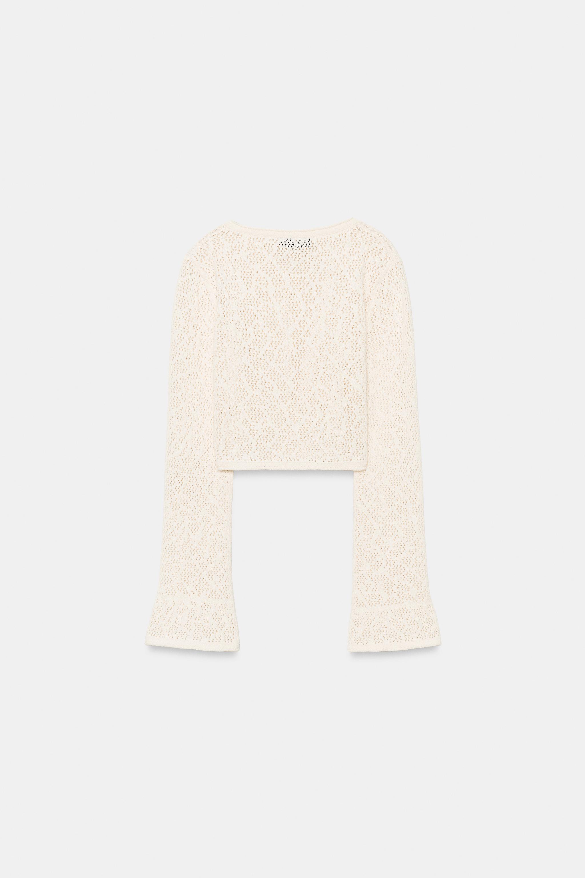 TOP COURT EN MAILLE POINTELLE