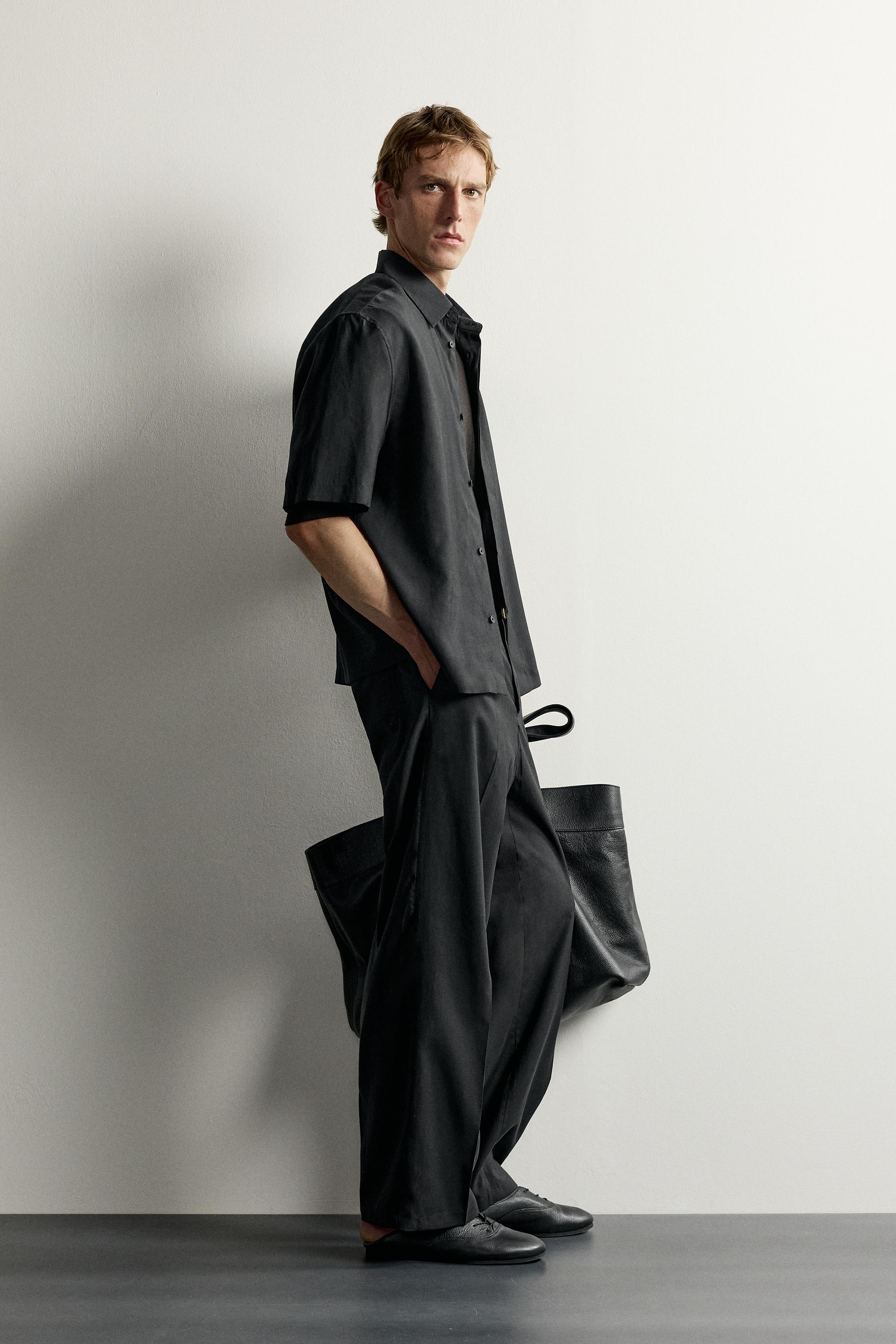 PLEATED FLOWY TROUSERS