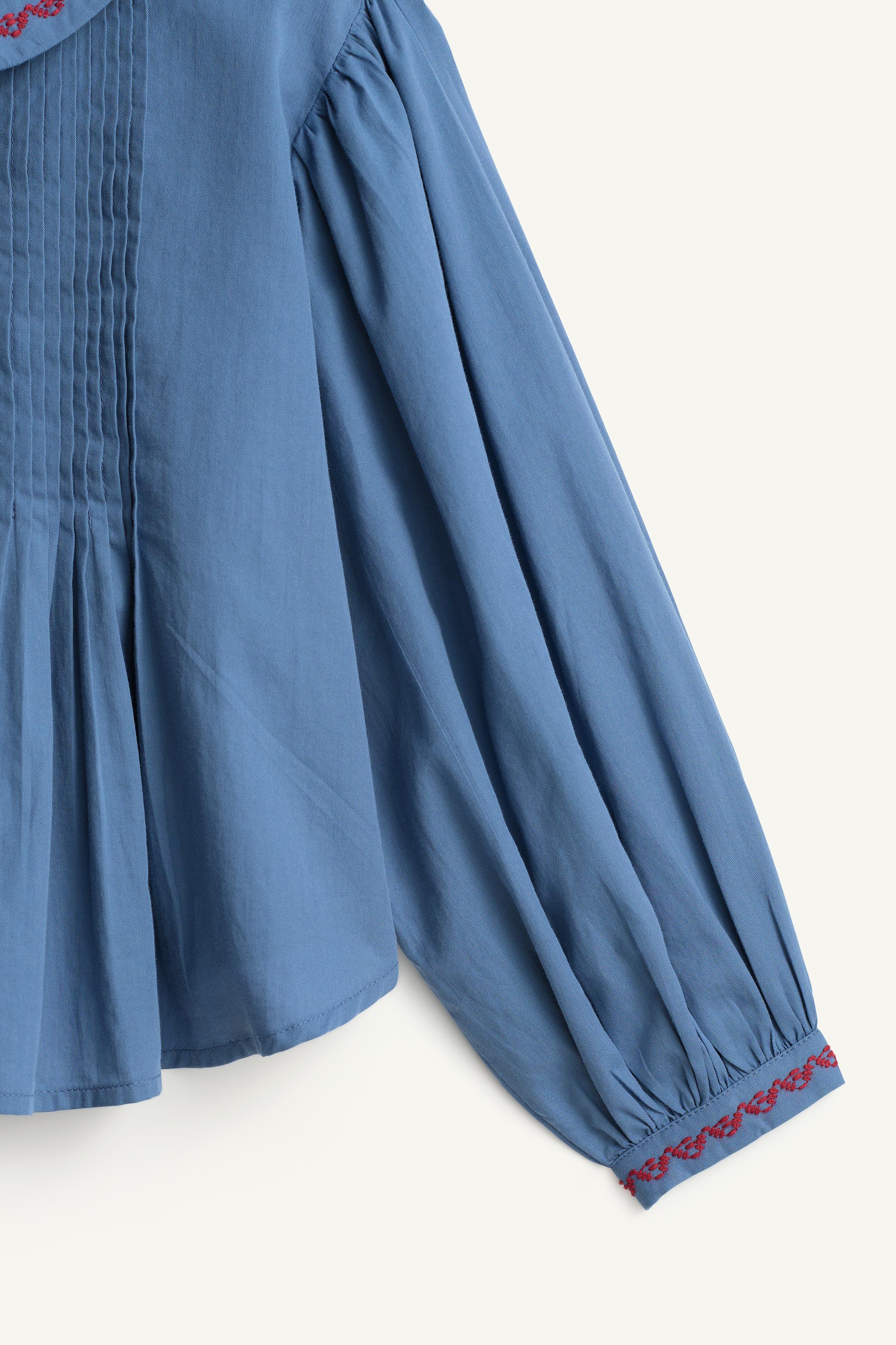 BLOUSE À PLIS NERVURÉS BRODÉE LIMITED EDITION