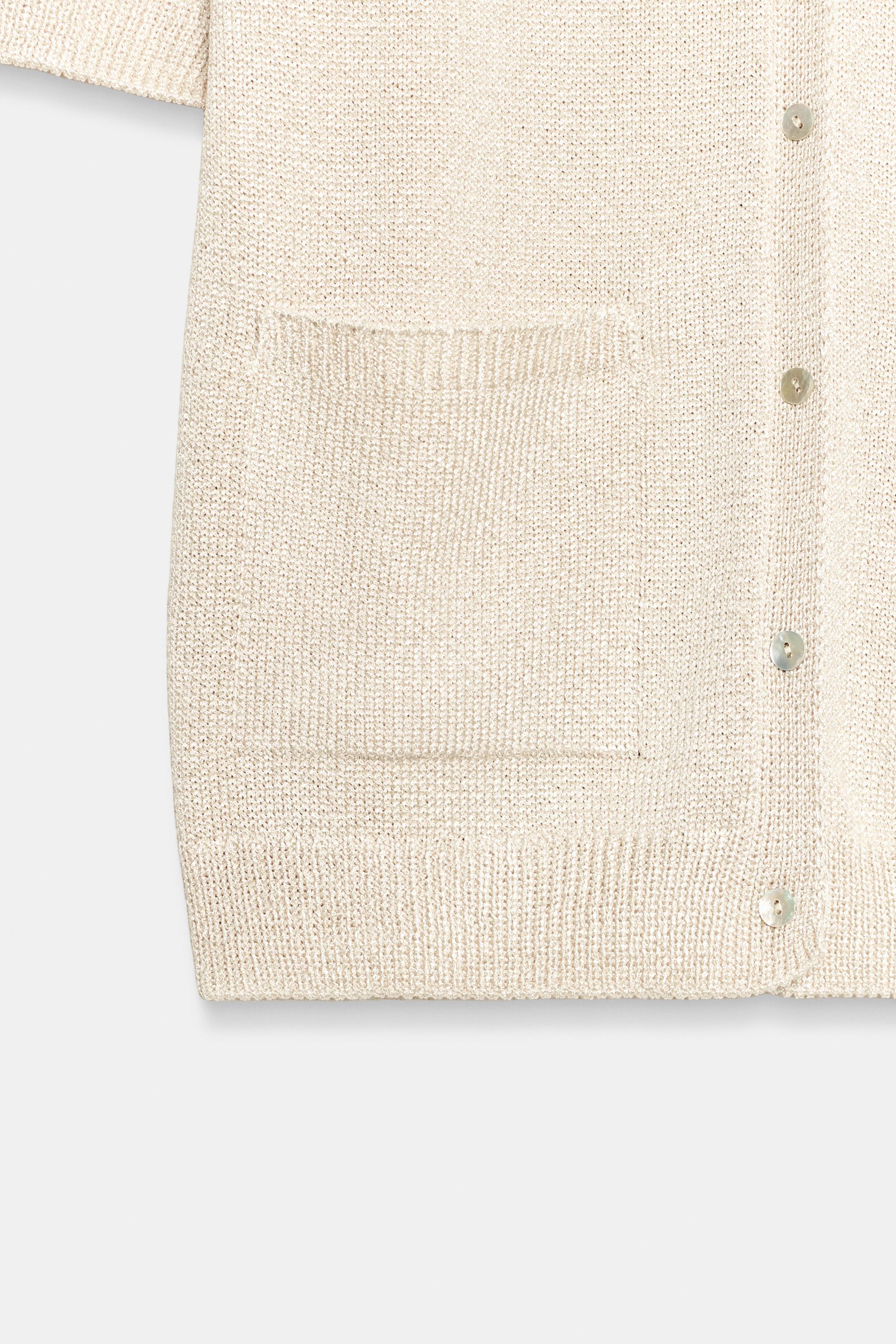 GILET EN MAILLE MANCHES COURTES