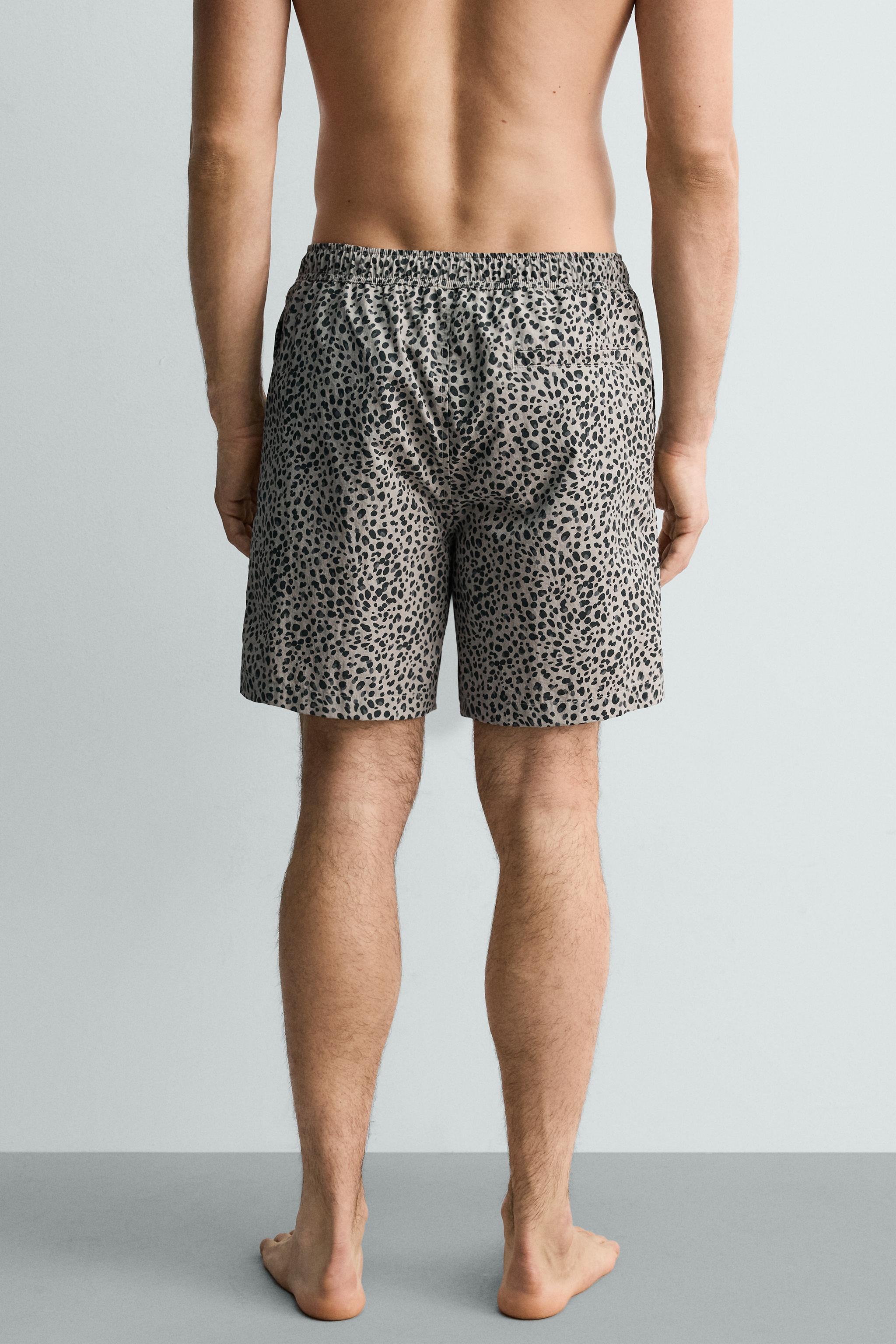 ANIMAL PRINT LONG SWIM TRUNKS