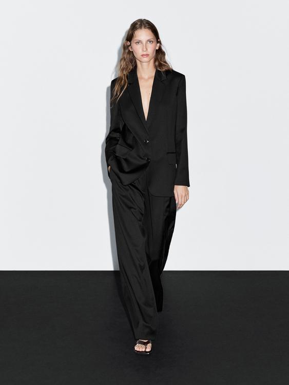 Pleated extra fine wool trousers