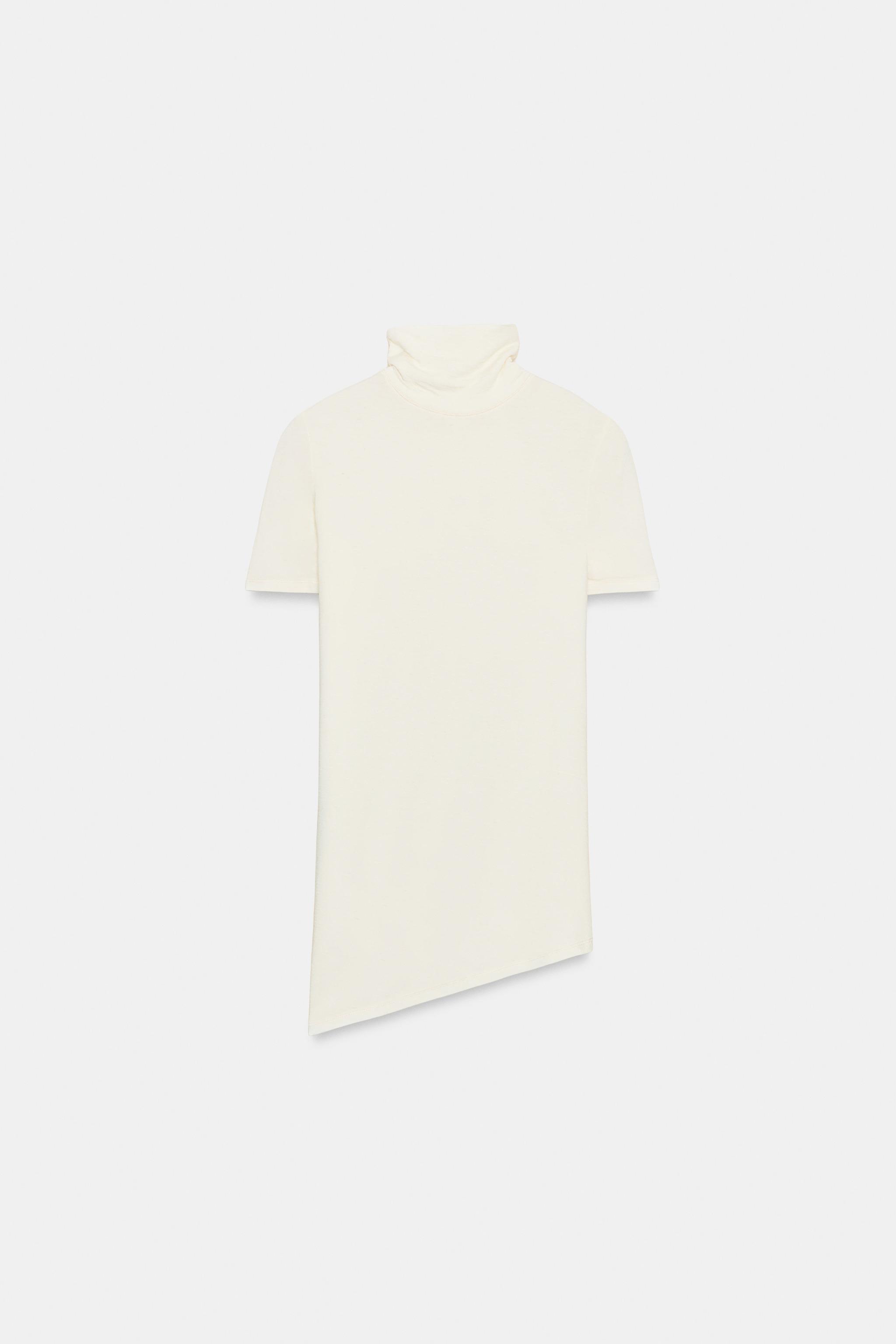 HAUT ASYMÉTRIQUE À COL ROULÉ