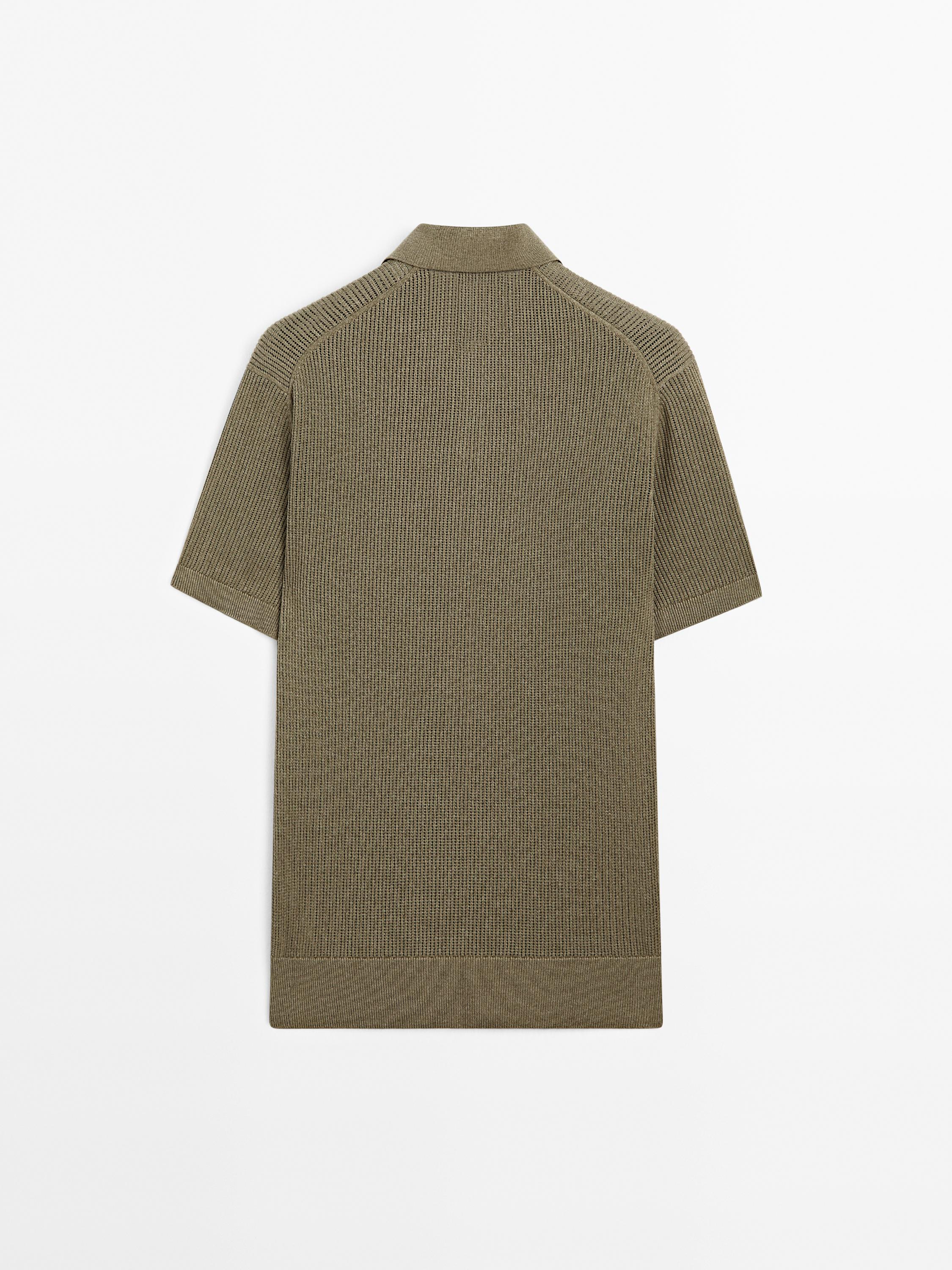 Polo en maille ajourée à col V