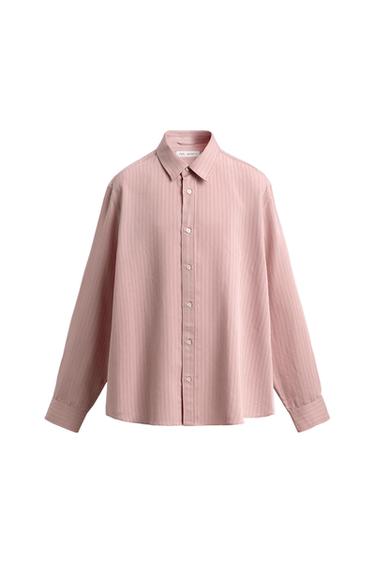 Long-sleeved pink shirt with fine vertical stripes, a classic collar and button-down front, on a white background.