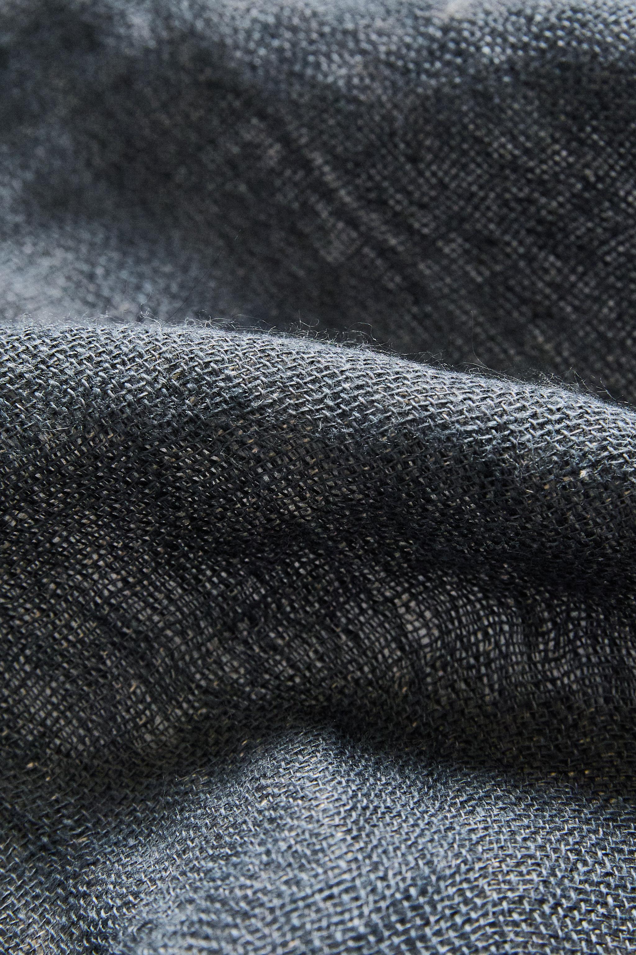 REVERSIBLE FRINGED LINEN BLANKET