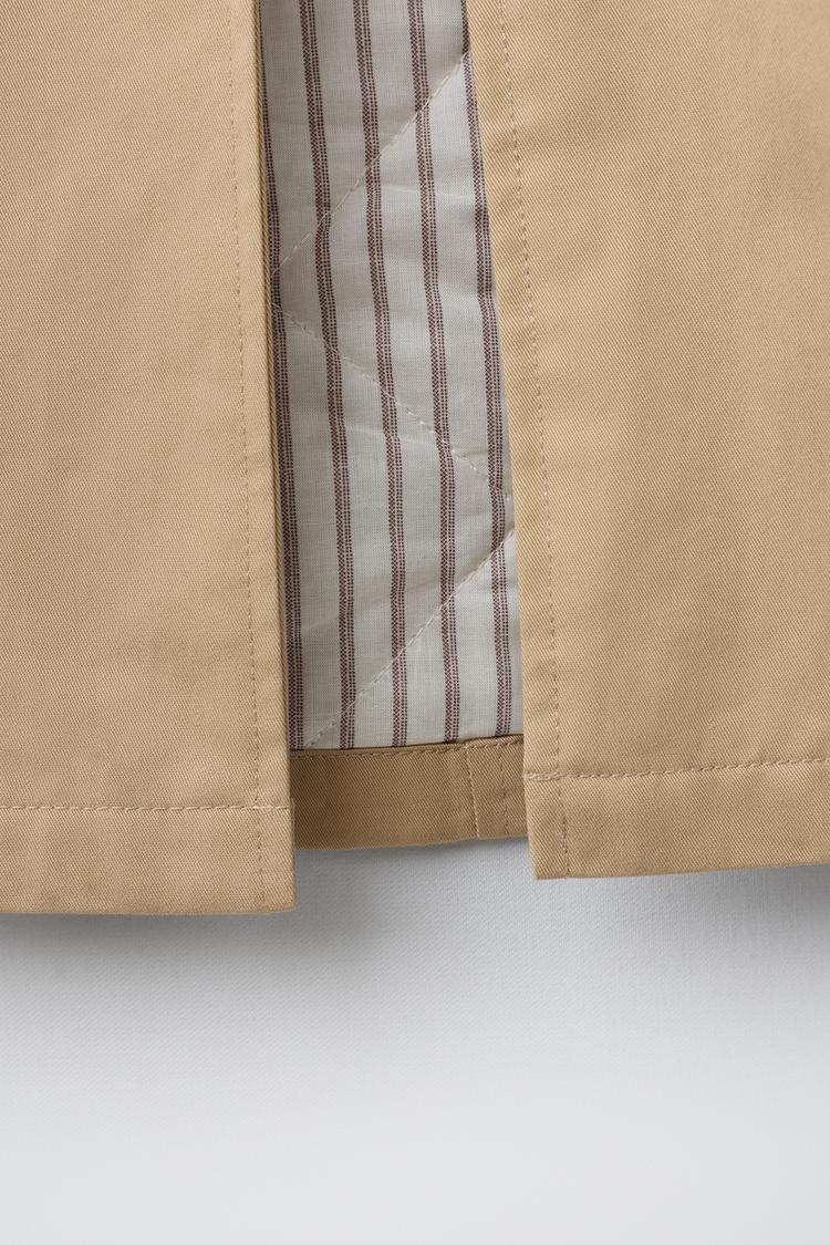 Trench coat con forro acolchado 8