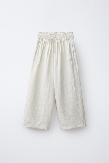 PANTALON À JAMBES LARGES EFFET FROISSÉ - Beige clair de Zara