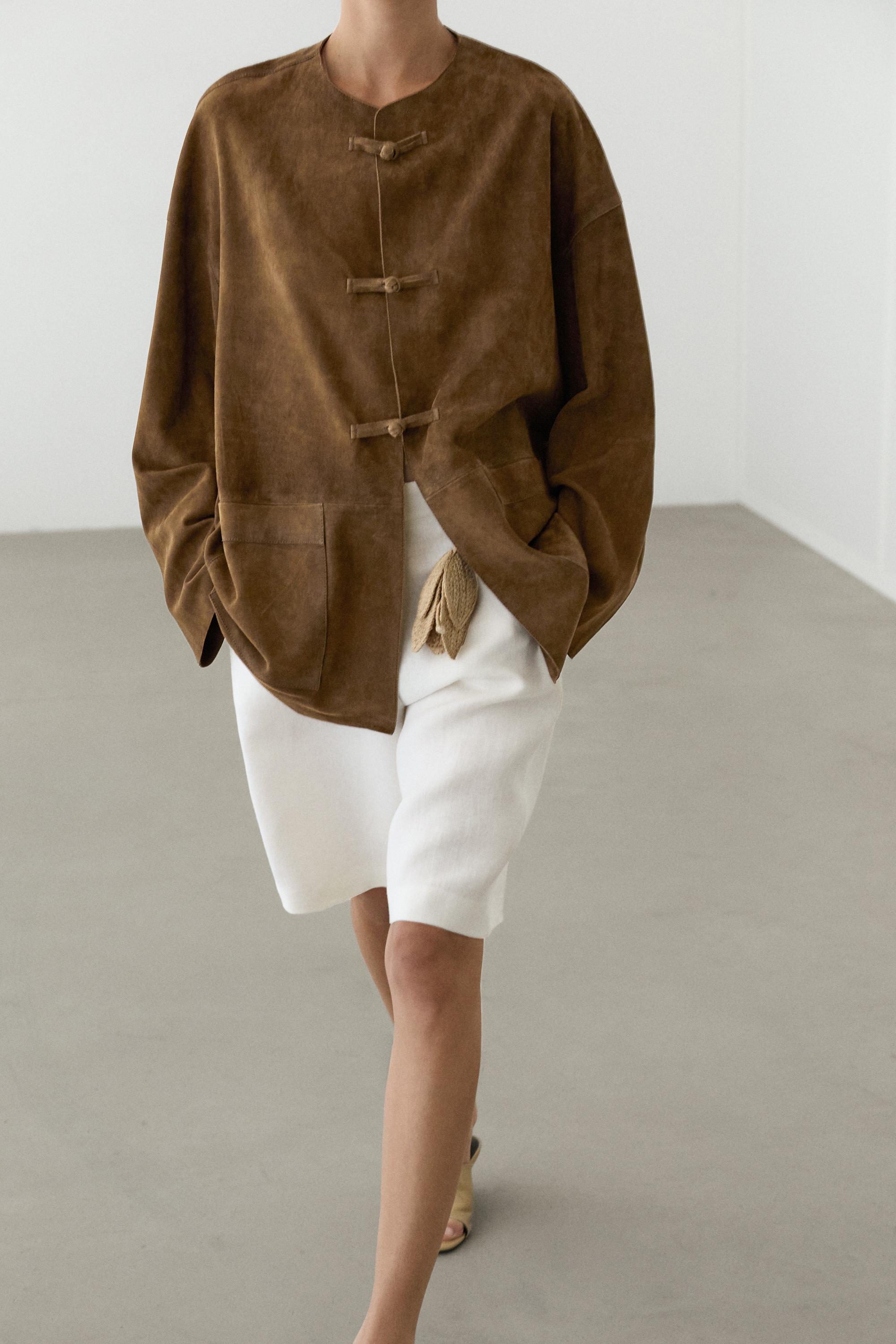Veste à col officier en cuir finition daim