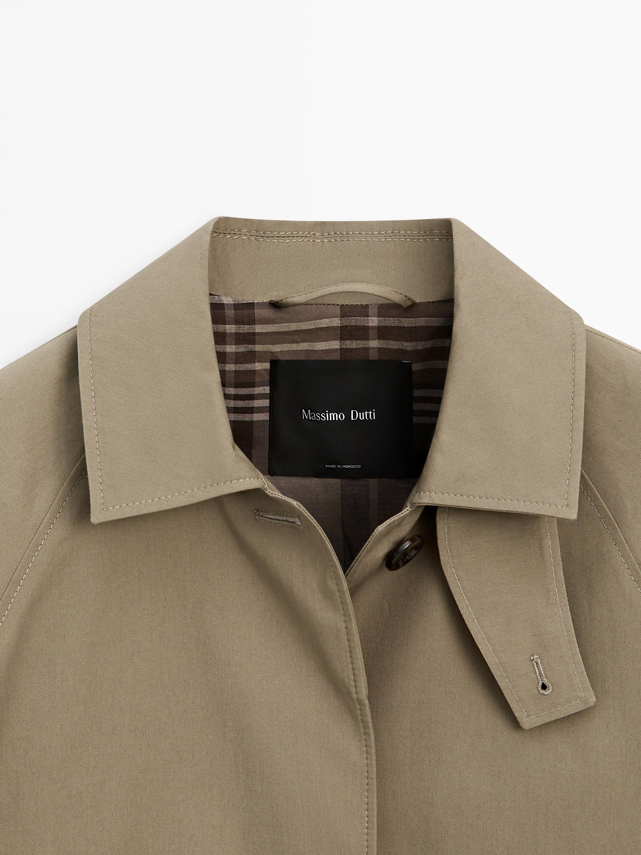 Oversize trench coat with check lining
