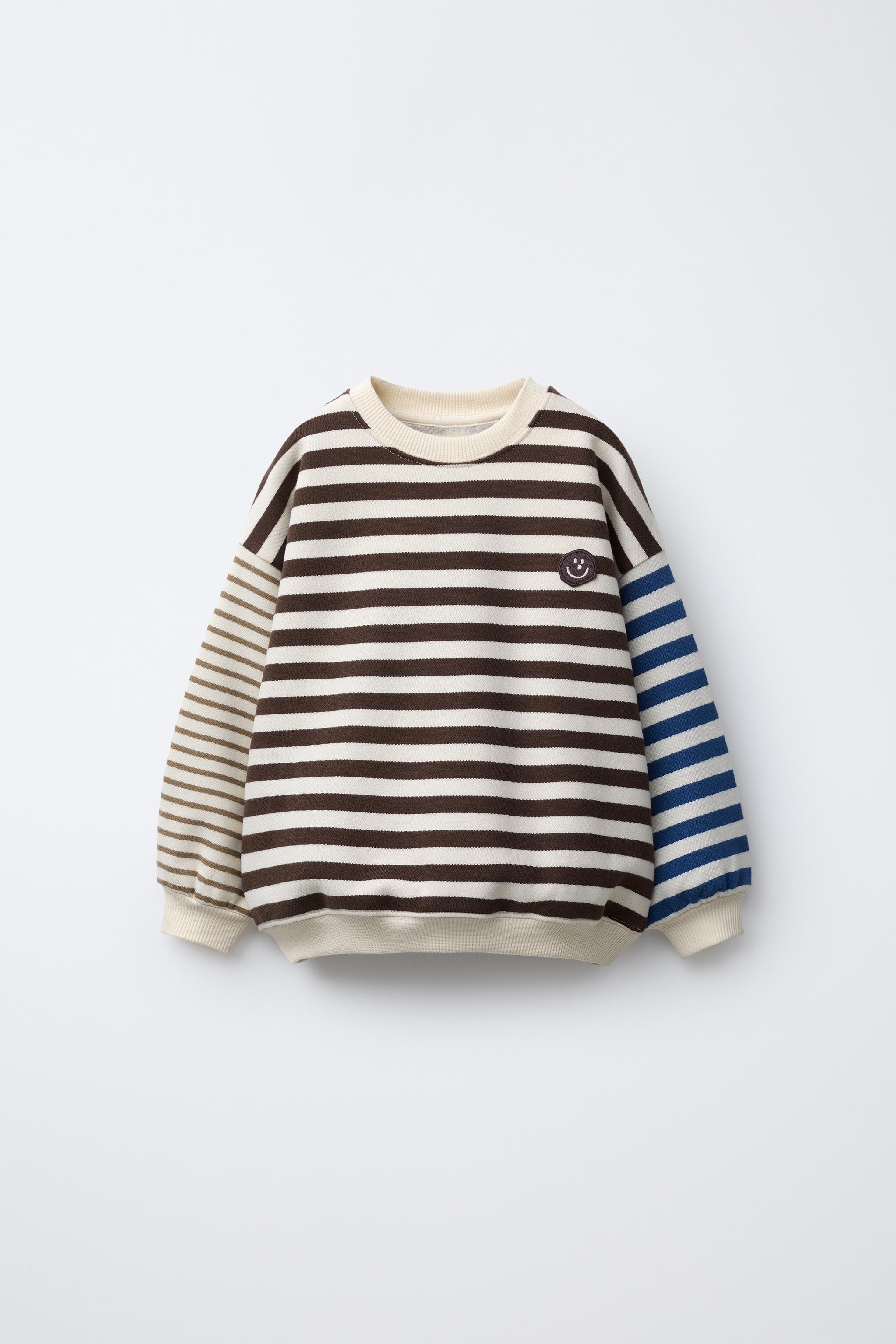 STRIPED SWEATSHIRT WITH FACE PATCH