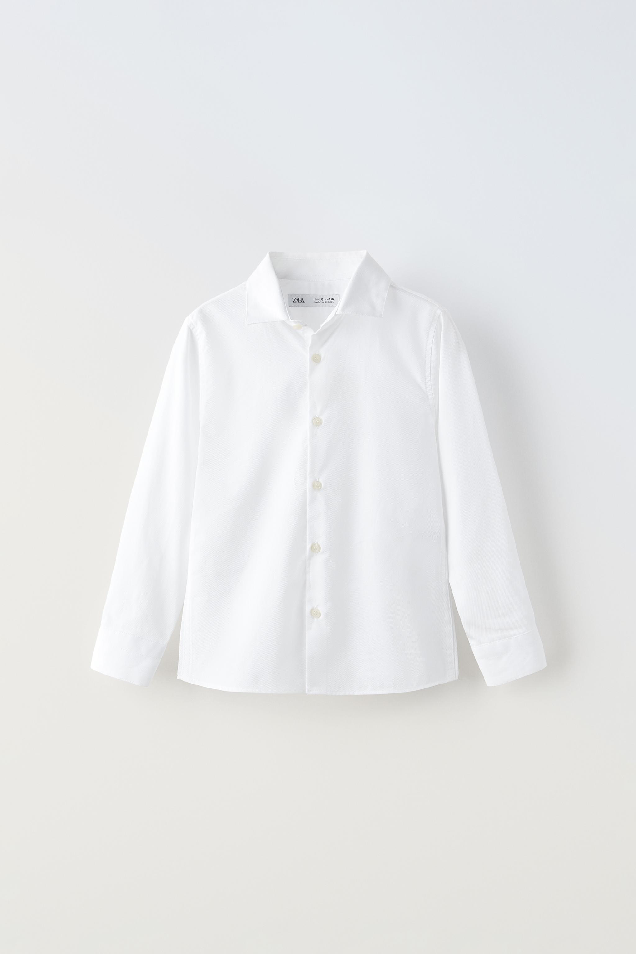 Camisas blancas de niña en zara online