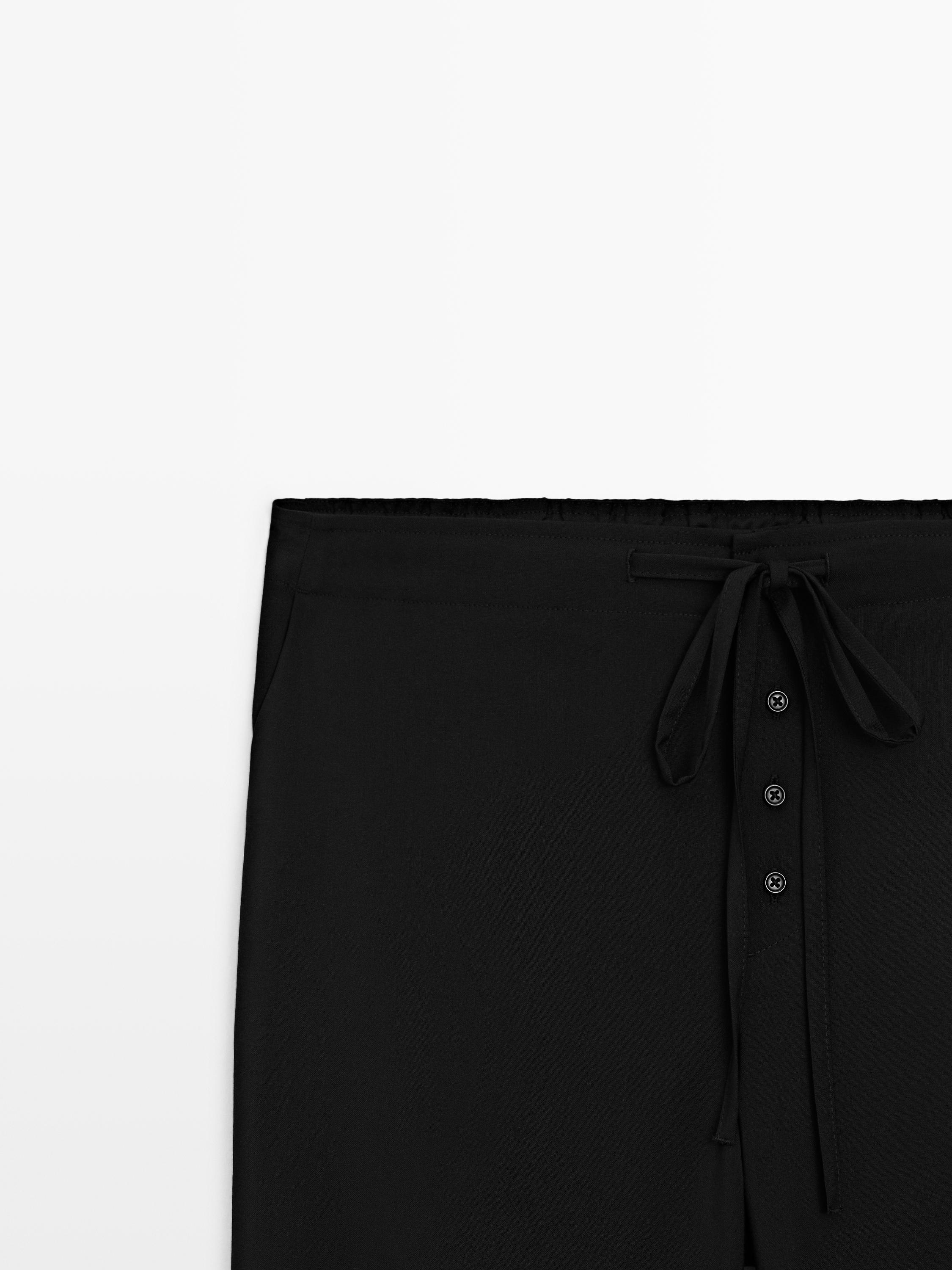 Wool sarouel trousers with tie detail