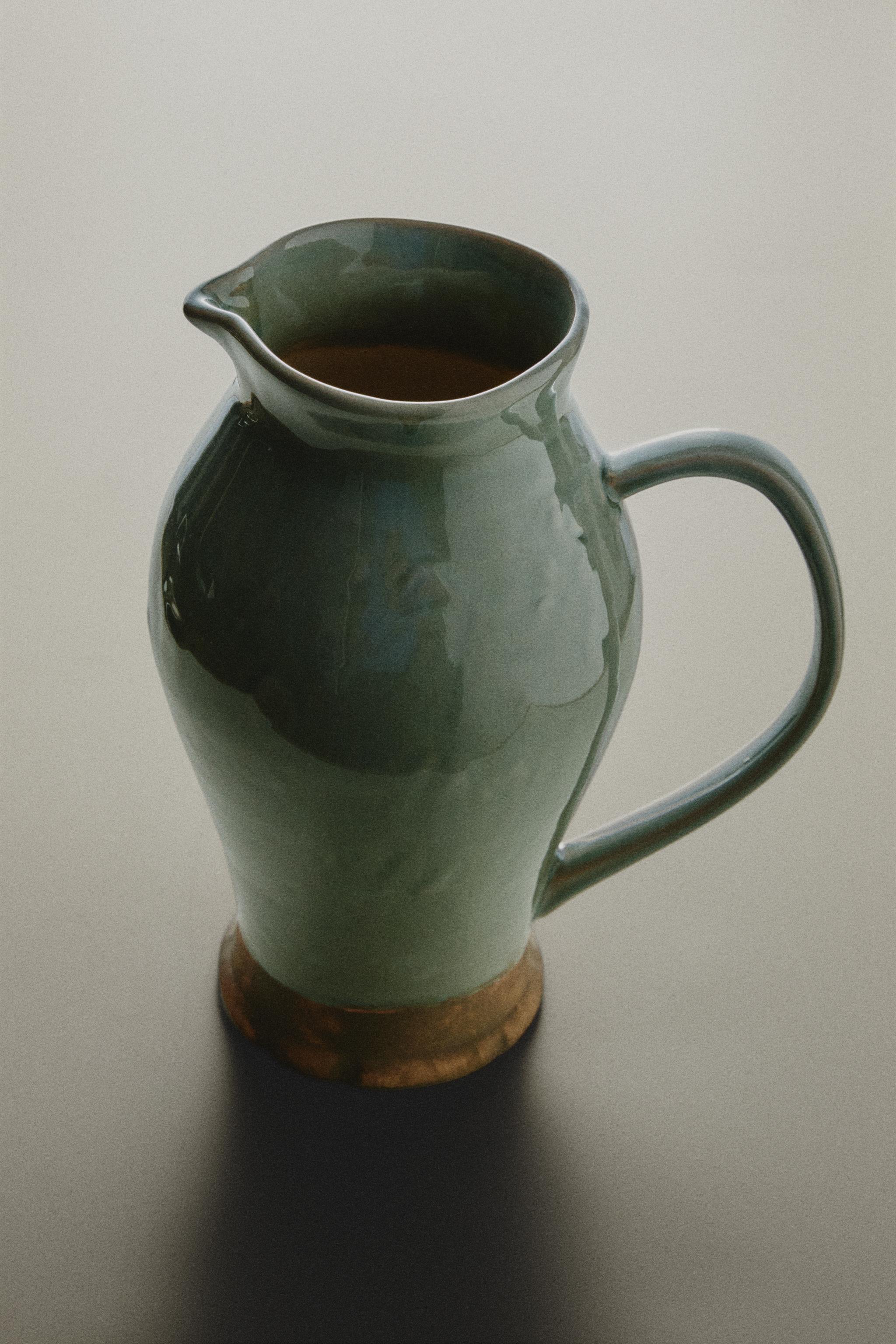 GREENISH CERAMIC VASE