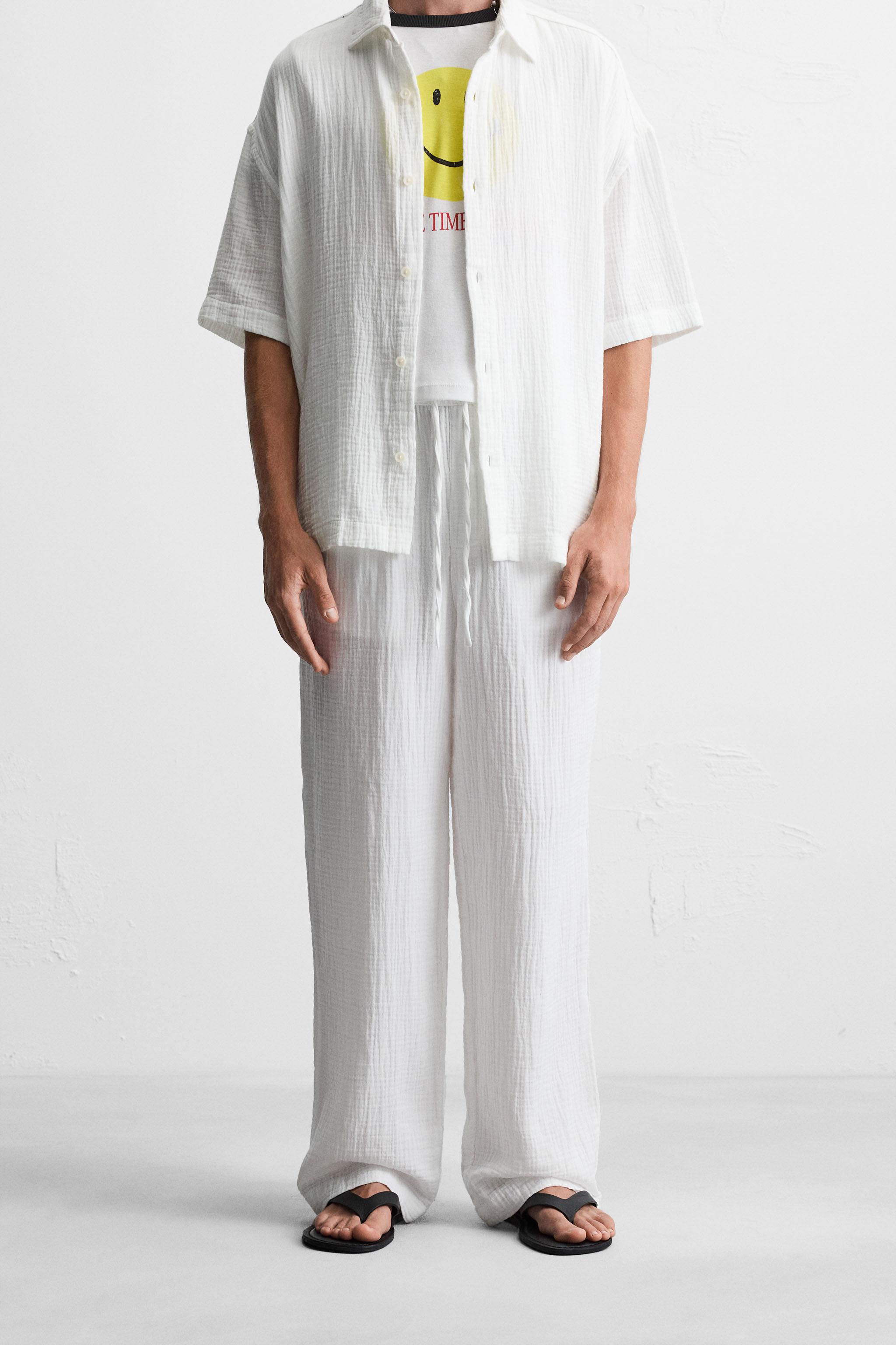 CRINKLED EFFECT PANTS