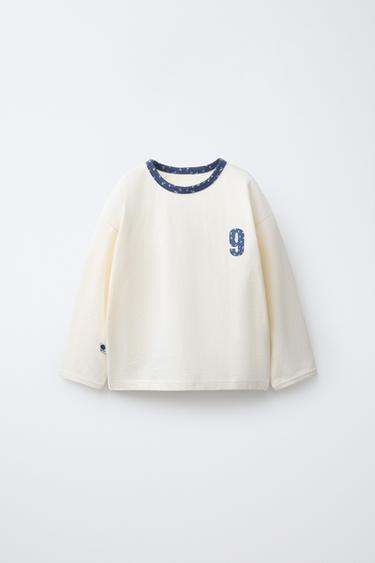 T-SHIRT WITH SLOGAN AND FLORAL PRINT - Light blue by Zara