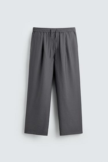 FLOWING TROUSERS WITH PLEATS - Grey by Zara
