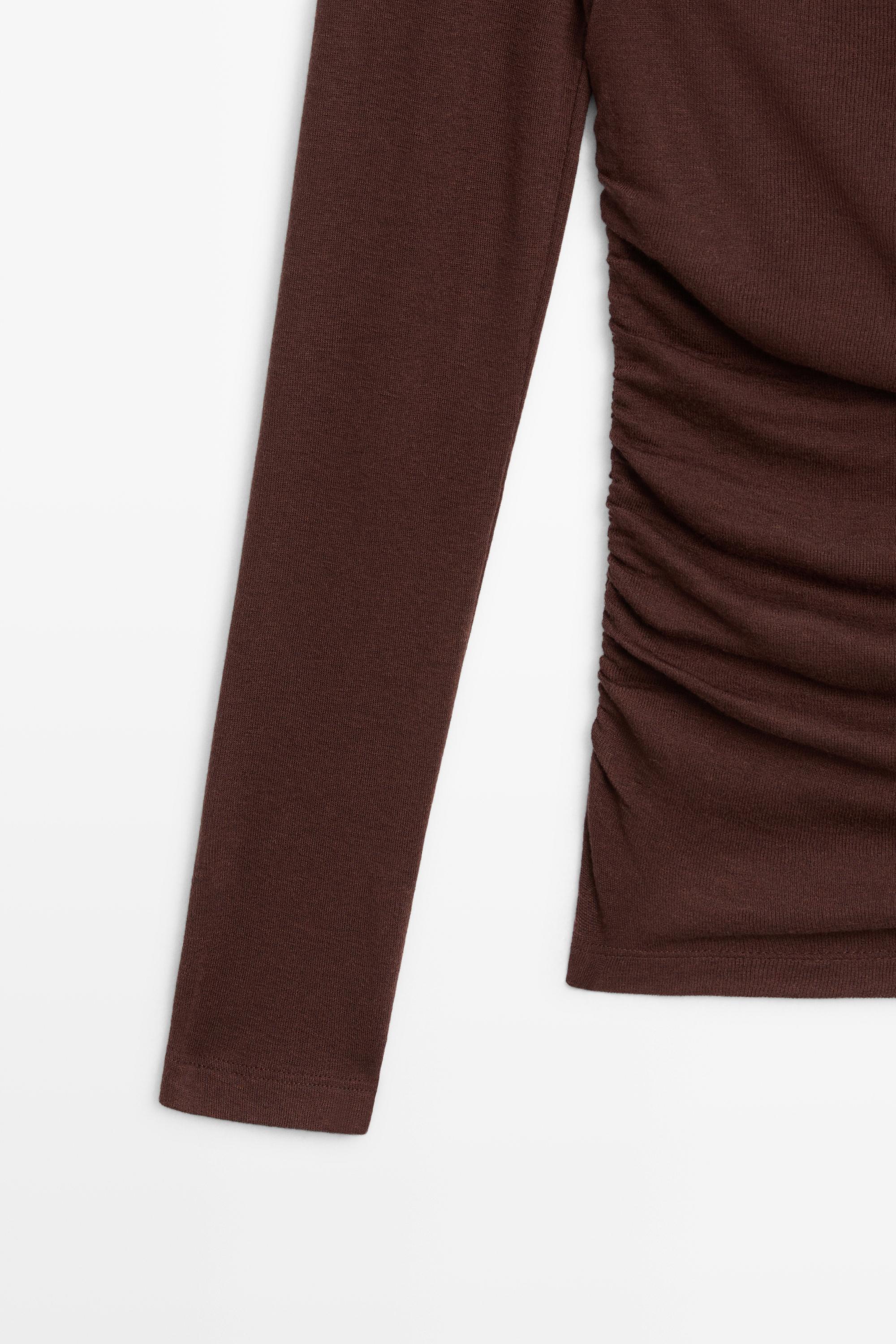 Asymmetric long sleeve flowing top