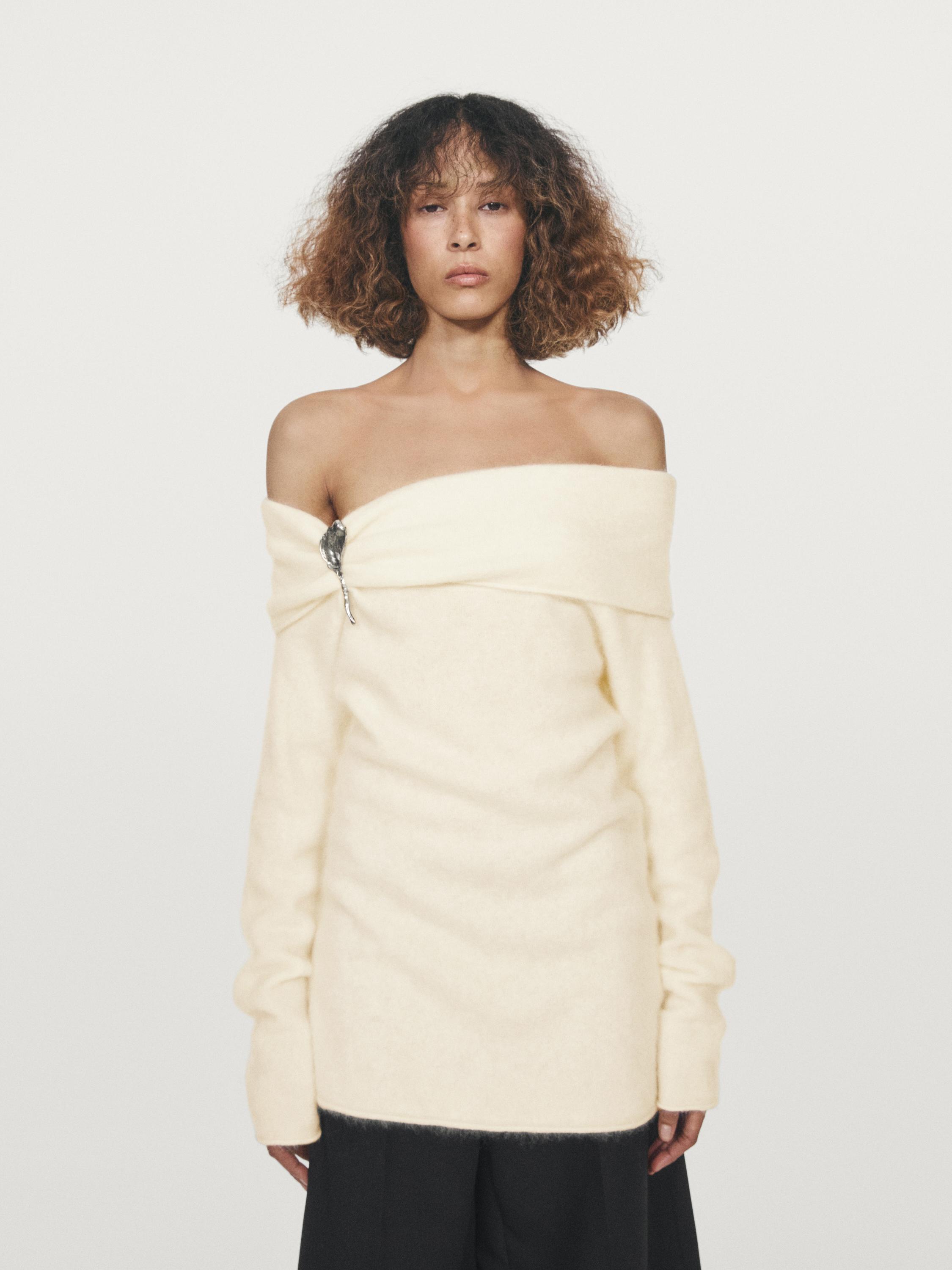 Knit wool and cashmere sweater with exposed shoulders