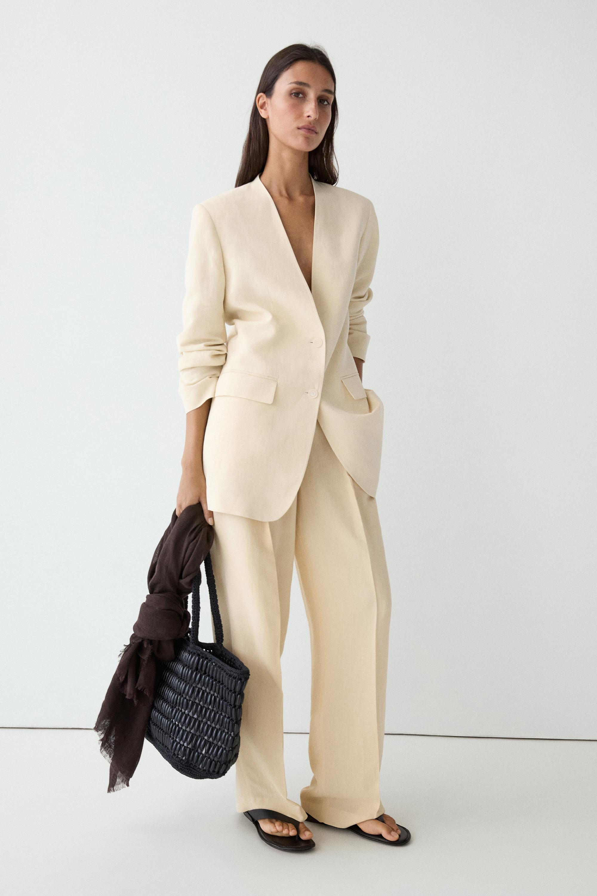 Flowing trousers with pleats — 318
