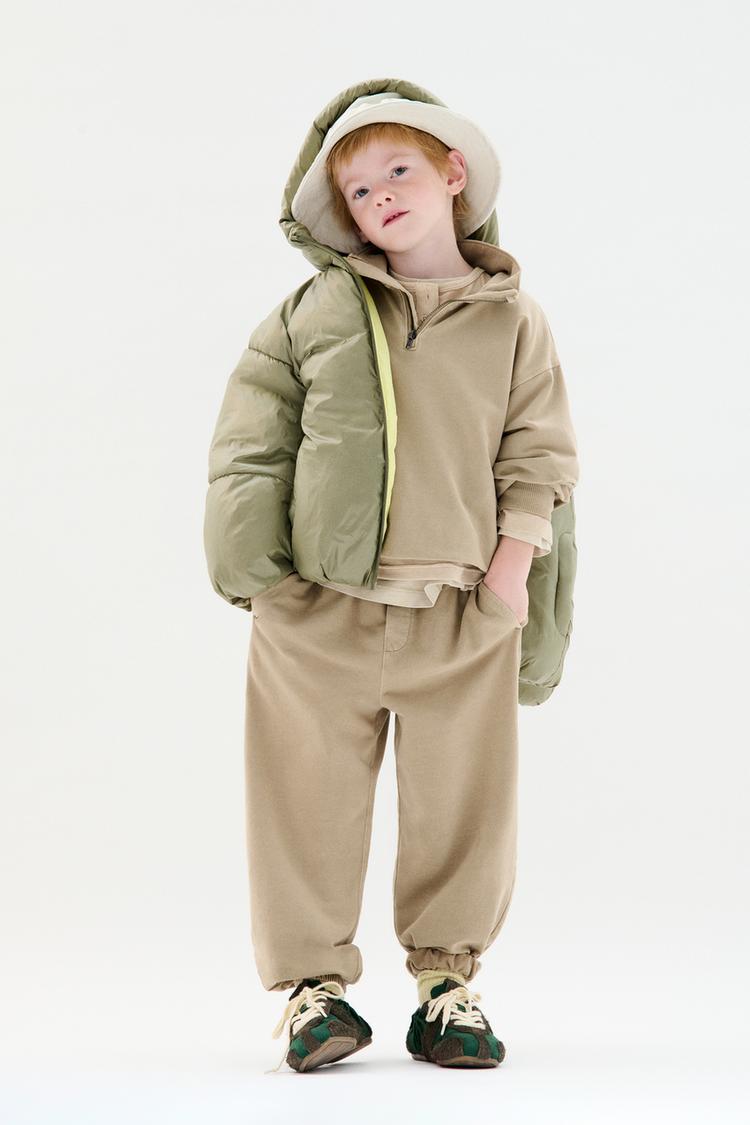 Abrigo acolchado engomado water repellent
