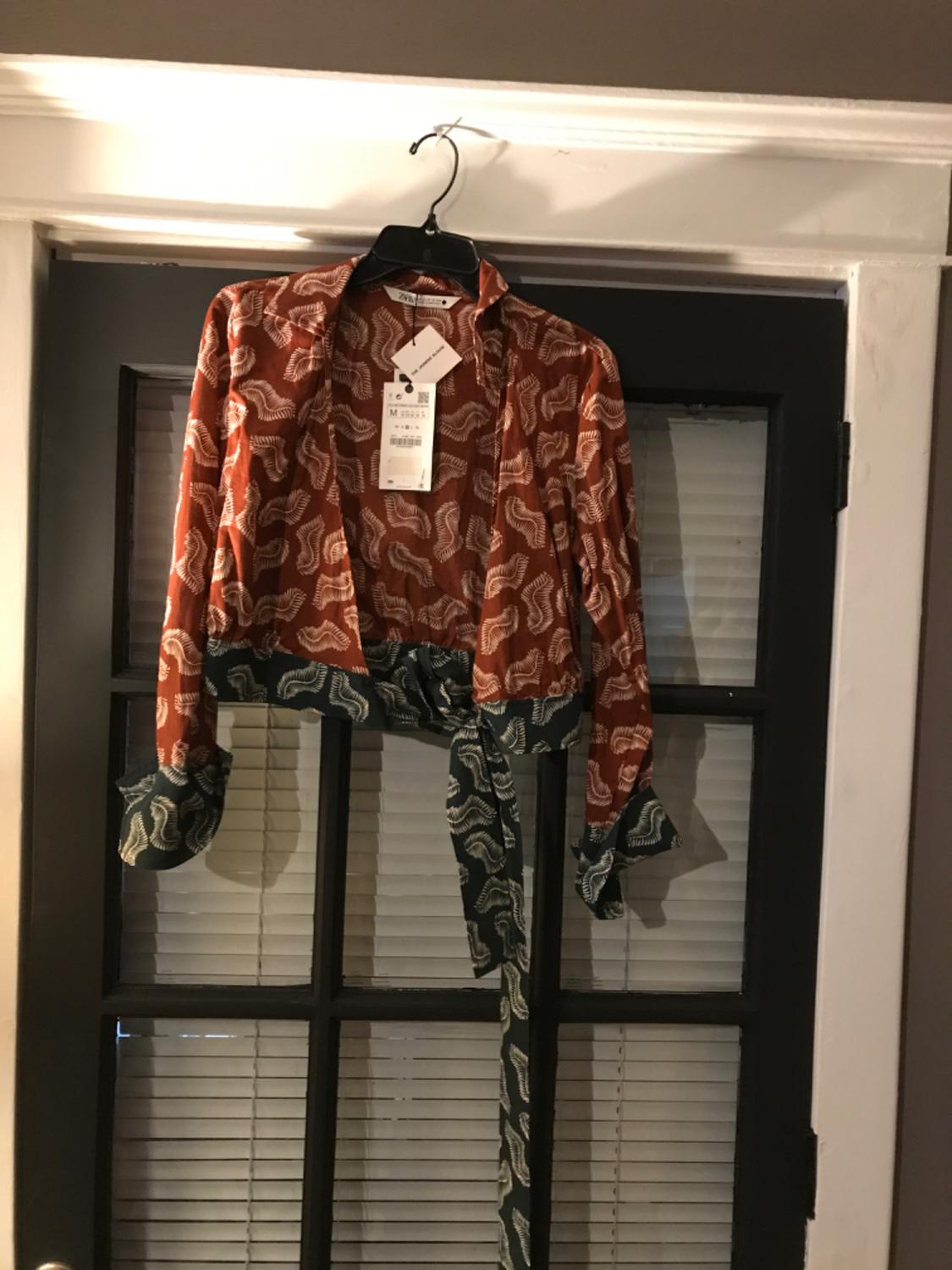 BLUSA CRUZADA ESTAMPADA