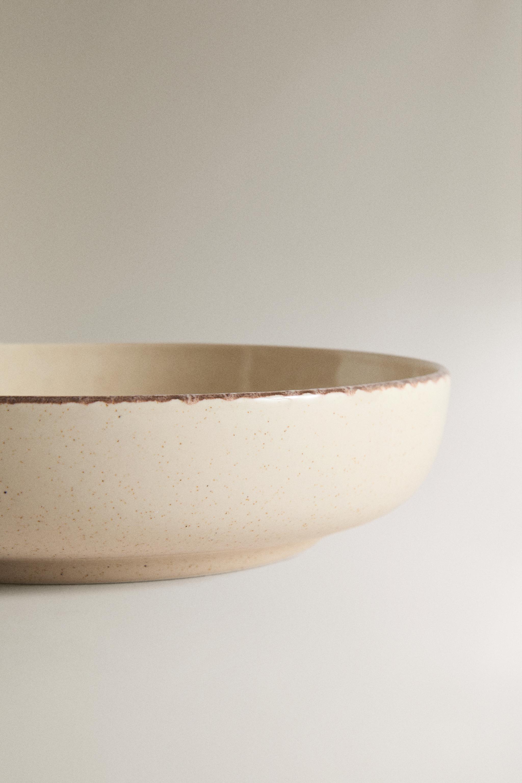STONEWARE SOUP PLATE WITH AGED RIM