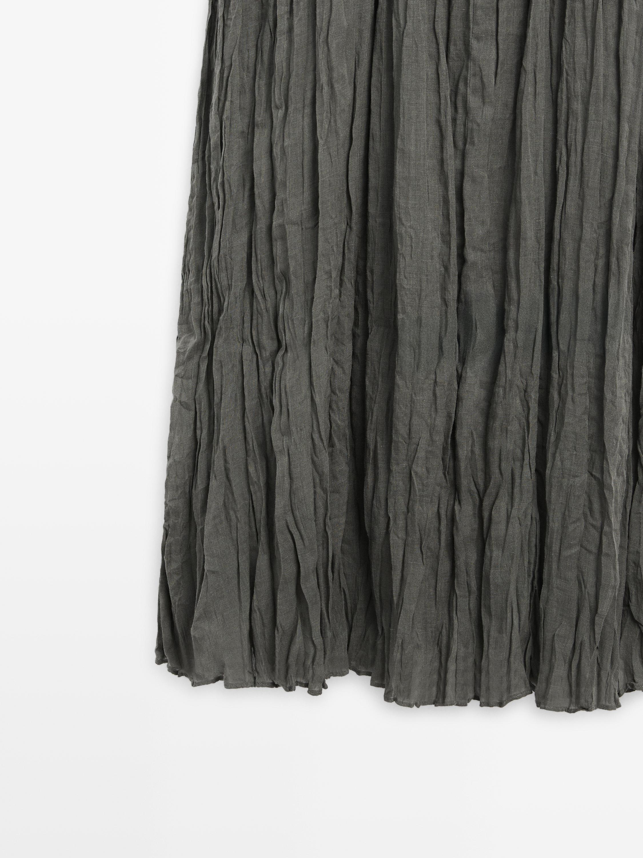 Textured flowing fabric dress with sash belt