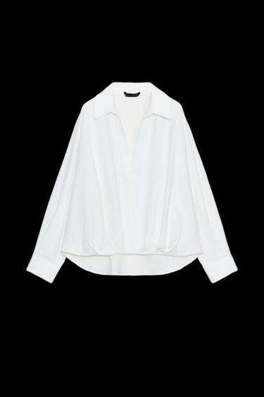 CAMISA CON LINO BAJO ABULLONADO - Blanco de Zara