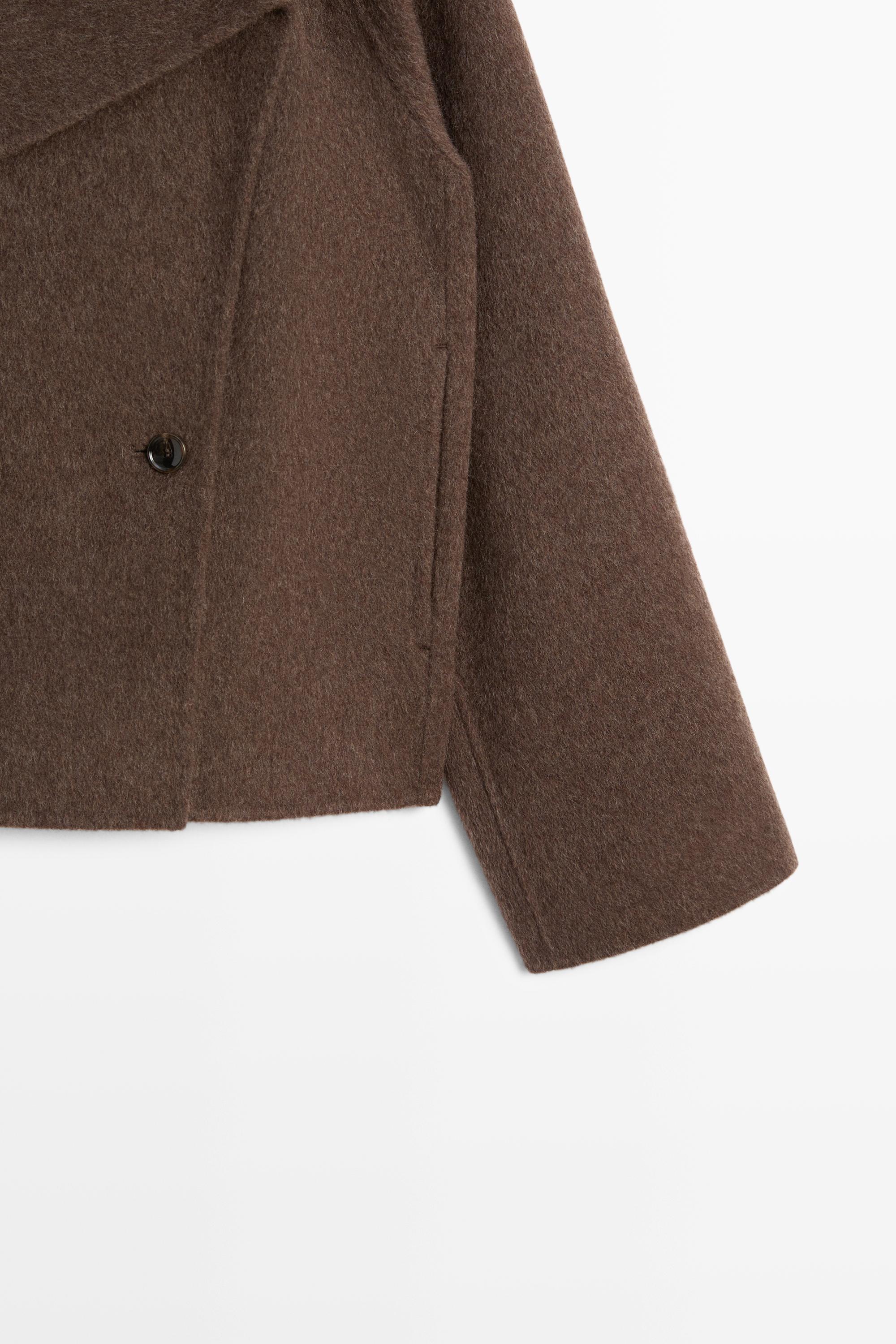 Short wool blend coat with side fastening
