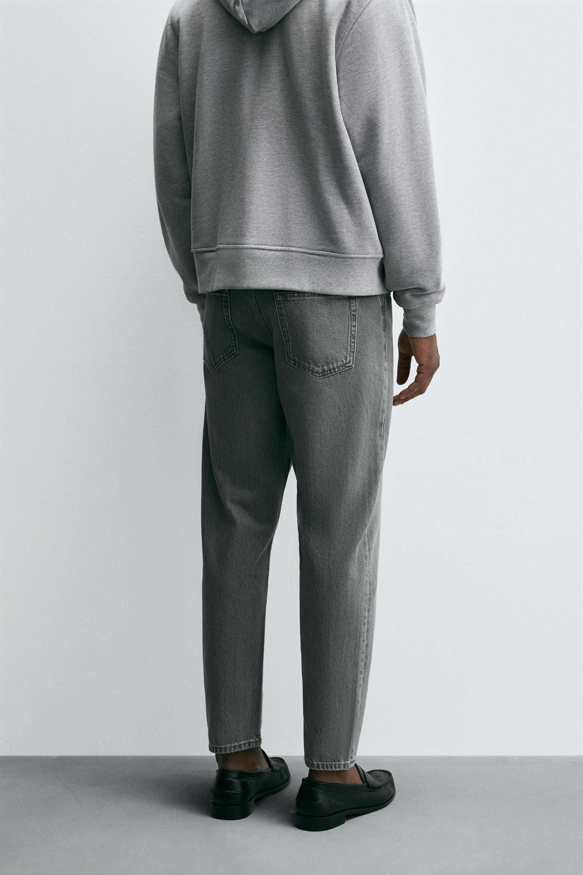 SLIM TAPERED FIT JEANS
