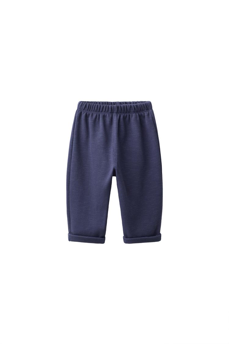 Pantalon bolsillo etiqueta