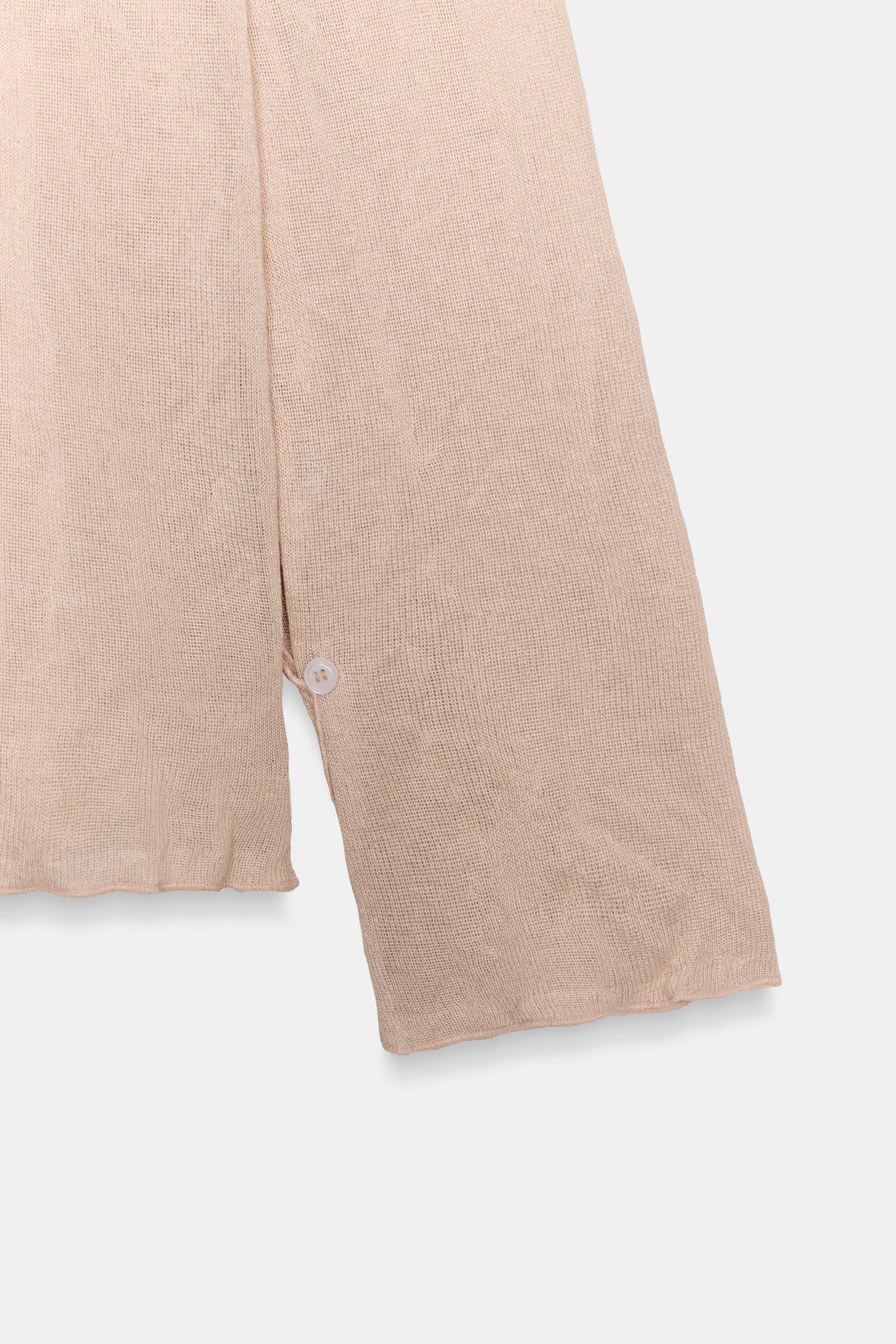 PULL EN MAILLE AVEC NŒUD ET EFFET FROISSÉ