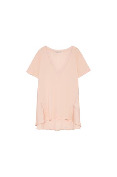 CONTRASTING T-SHIRT WITH IRREGULAR HEM
