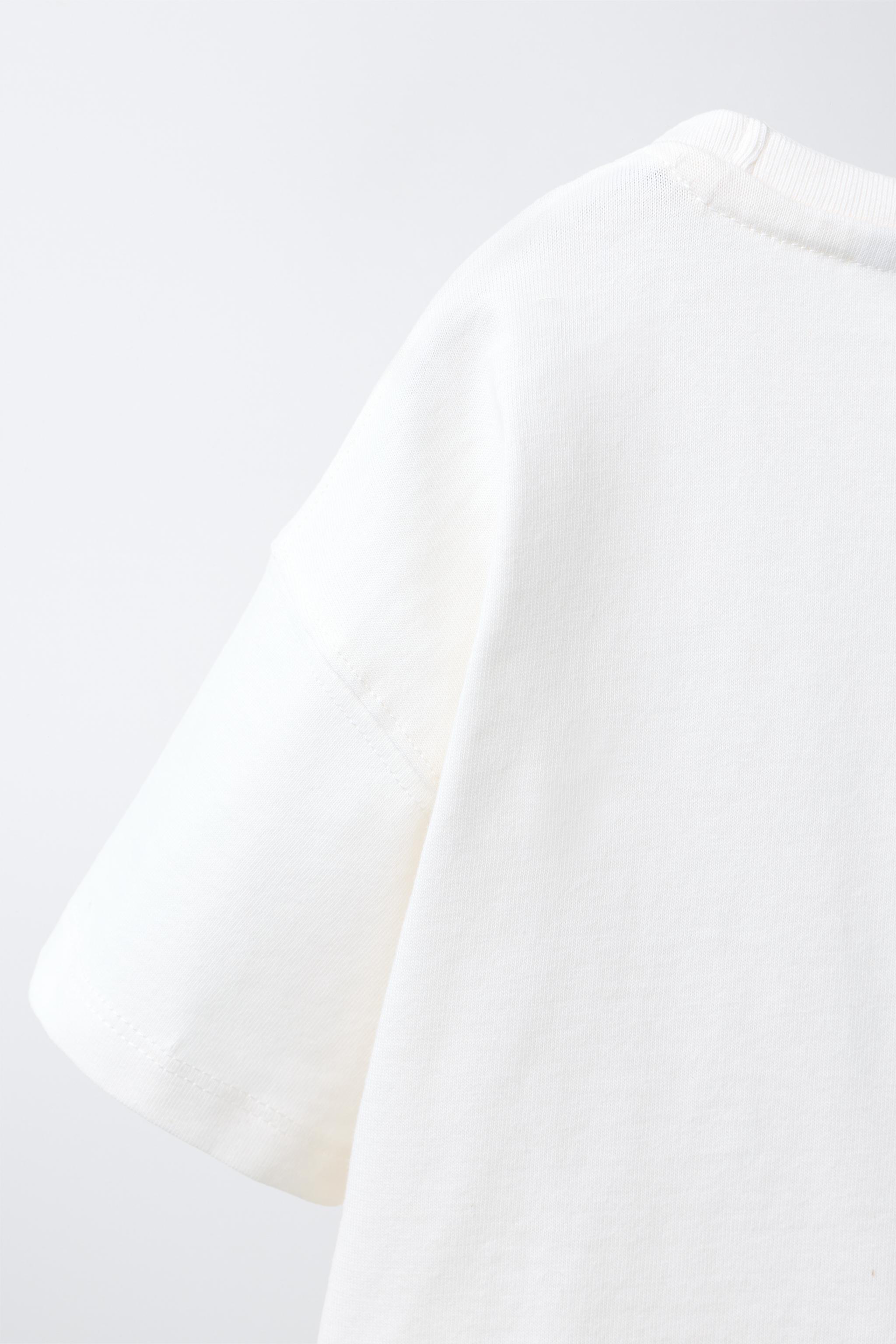 T-SHIRT À POCHE EN CROCHET